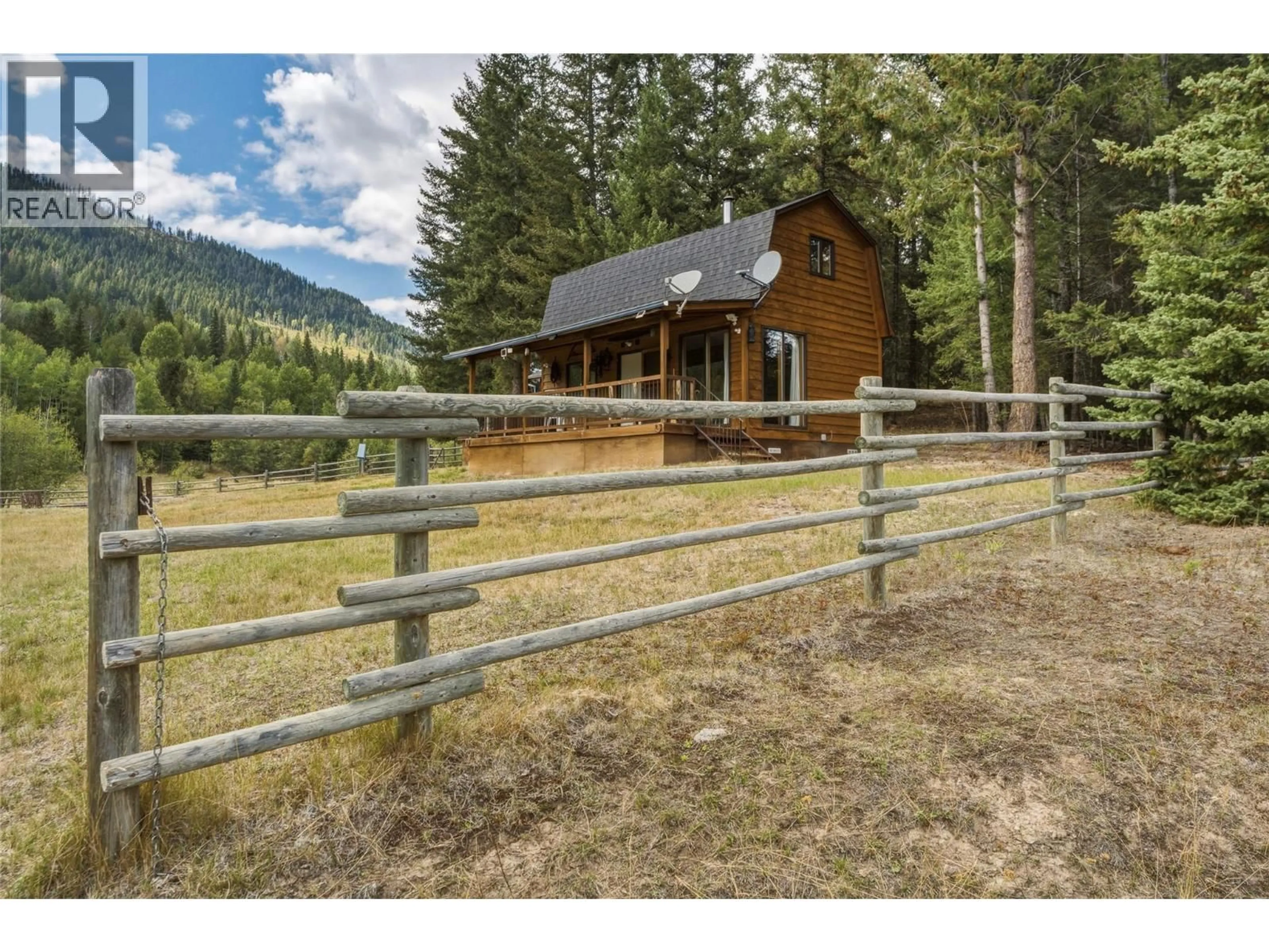 A pic from outside/outdoor area/front of a property/back of a property/a pic from drone, mountain view for 6860 MARTIN PRAIRIE ROAD, Falkland British Columbia V0E1W1