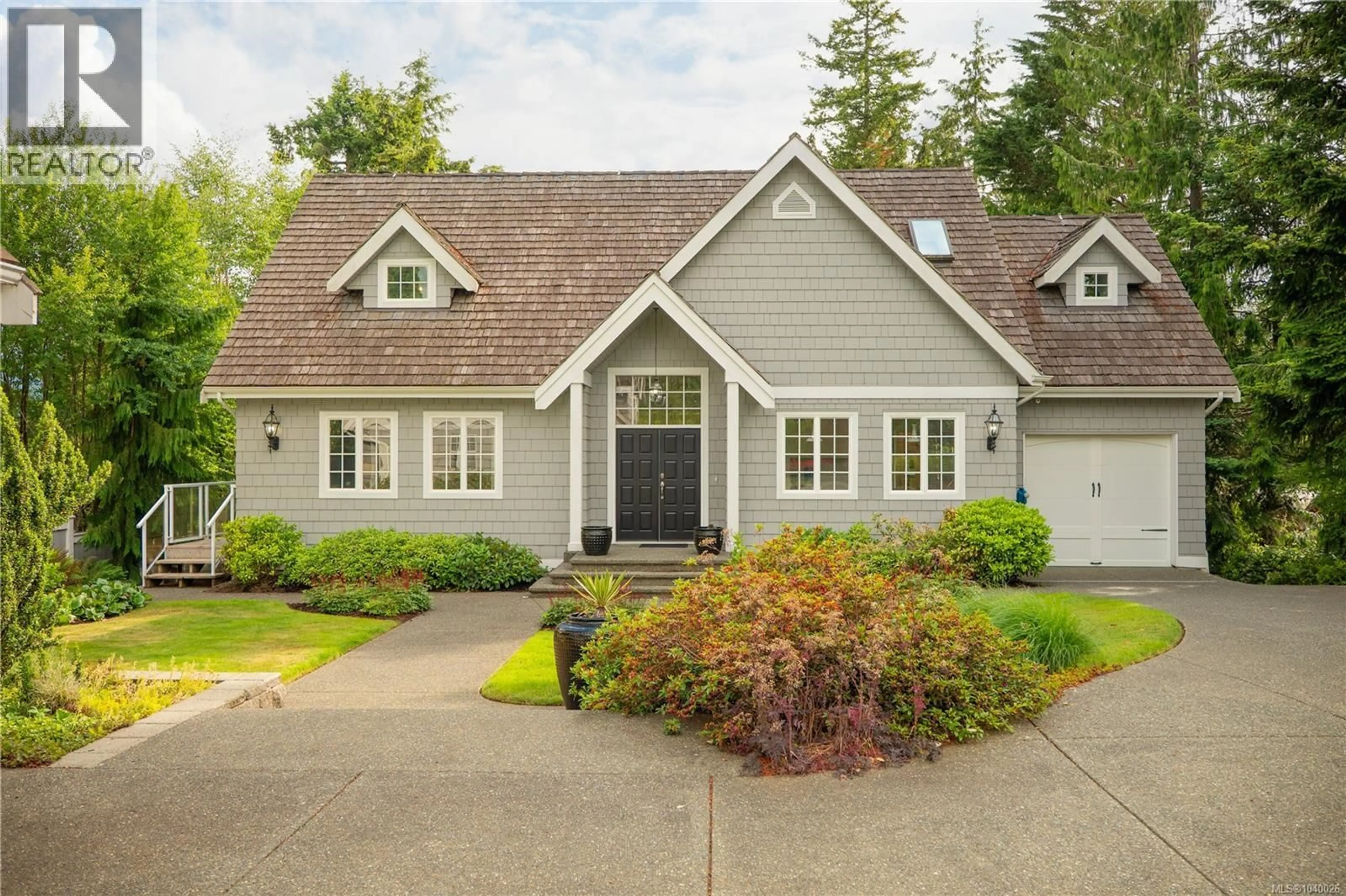 Home with vinyl exterior material, street for 182 BAYNES DRIVE, Fanny Bay British Columbia V0R1W0