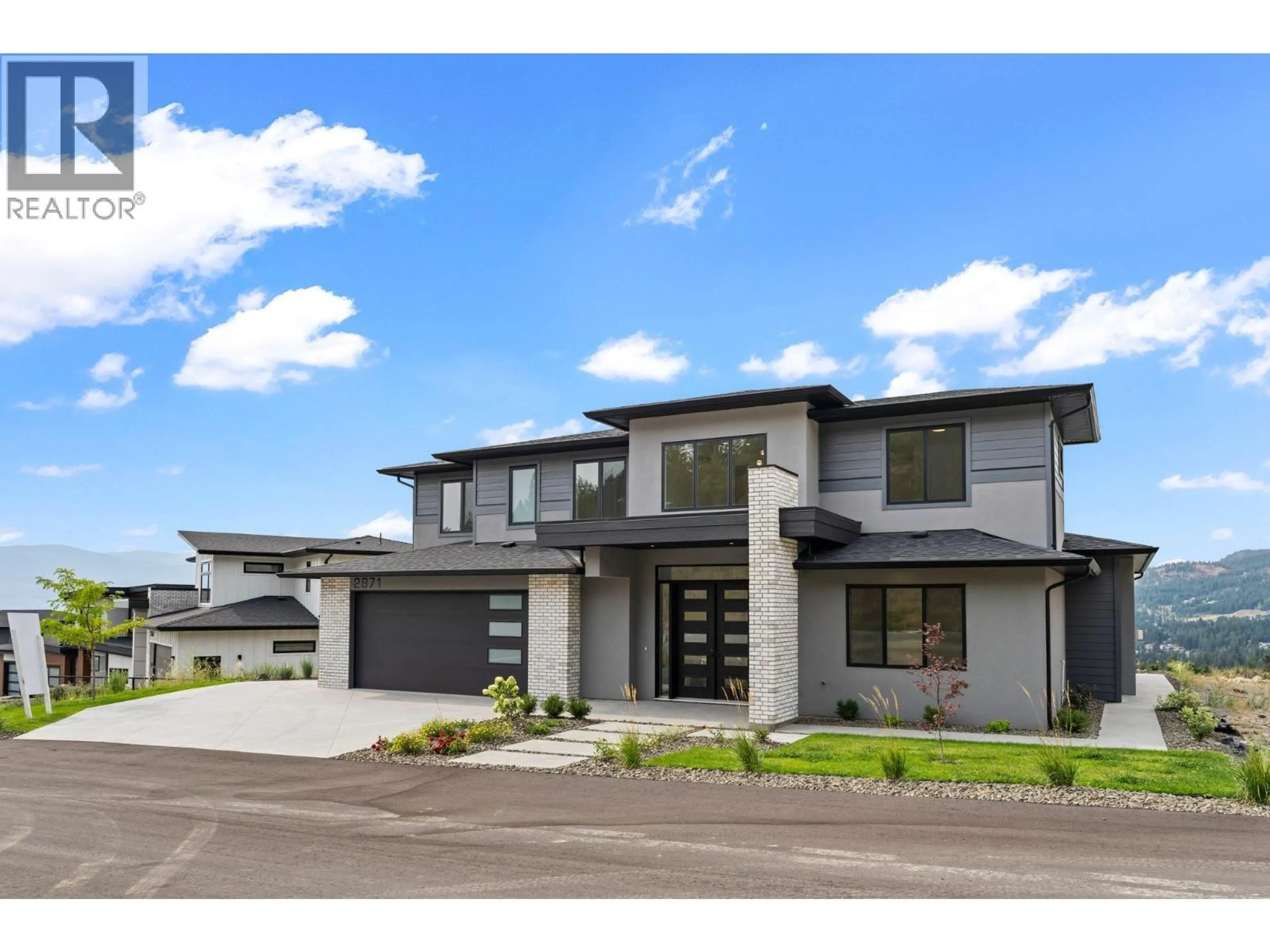 Home with brick exterior material, street for 2871 COPPER RIDGE DRIVE, West Kelowna British Columbia V4T0E7