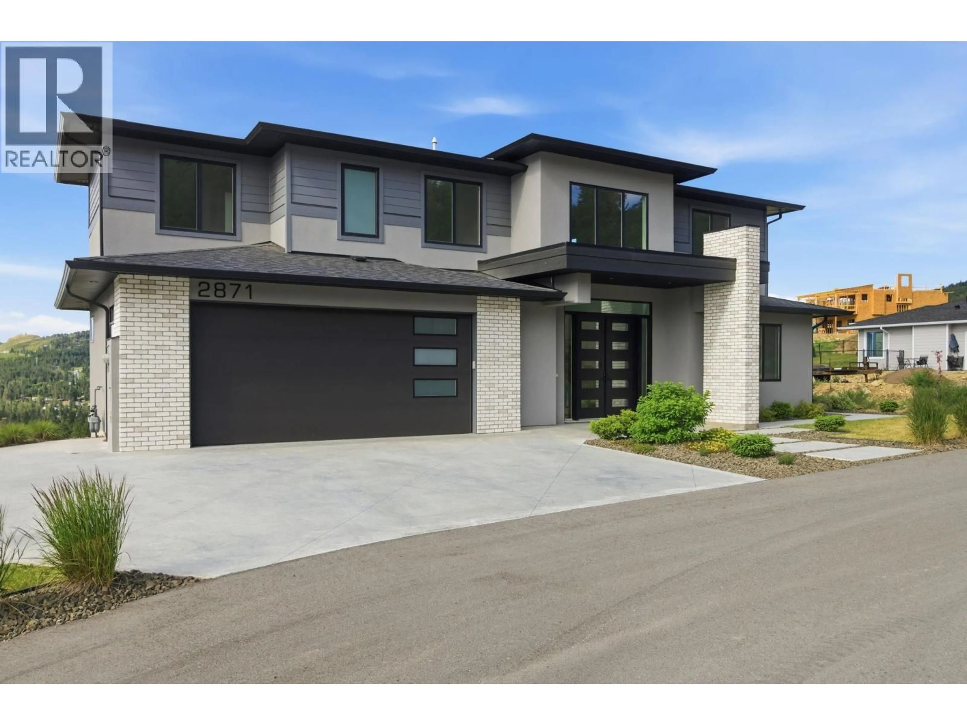 Home with brick exterior material, street for 2871 COPPER RIDGE DRIVE, West Kelowna British Columbia V4T0E7