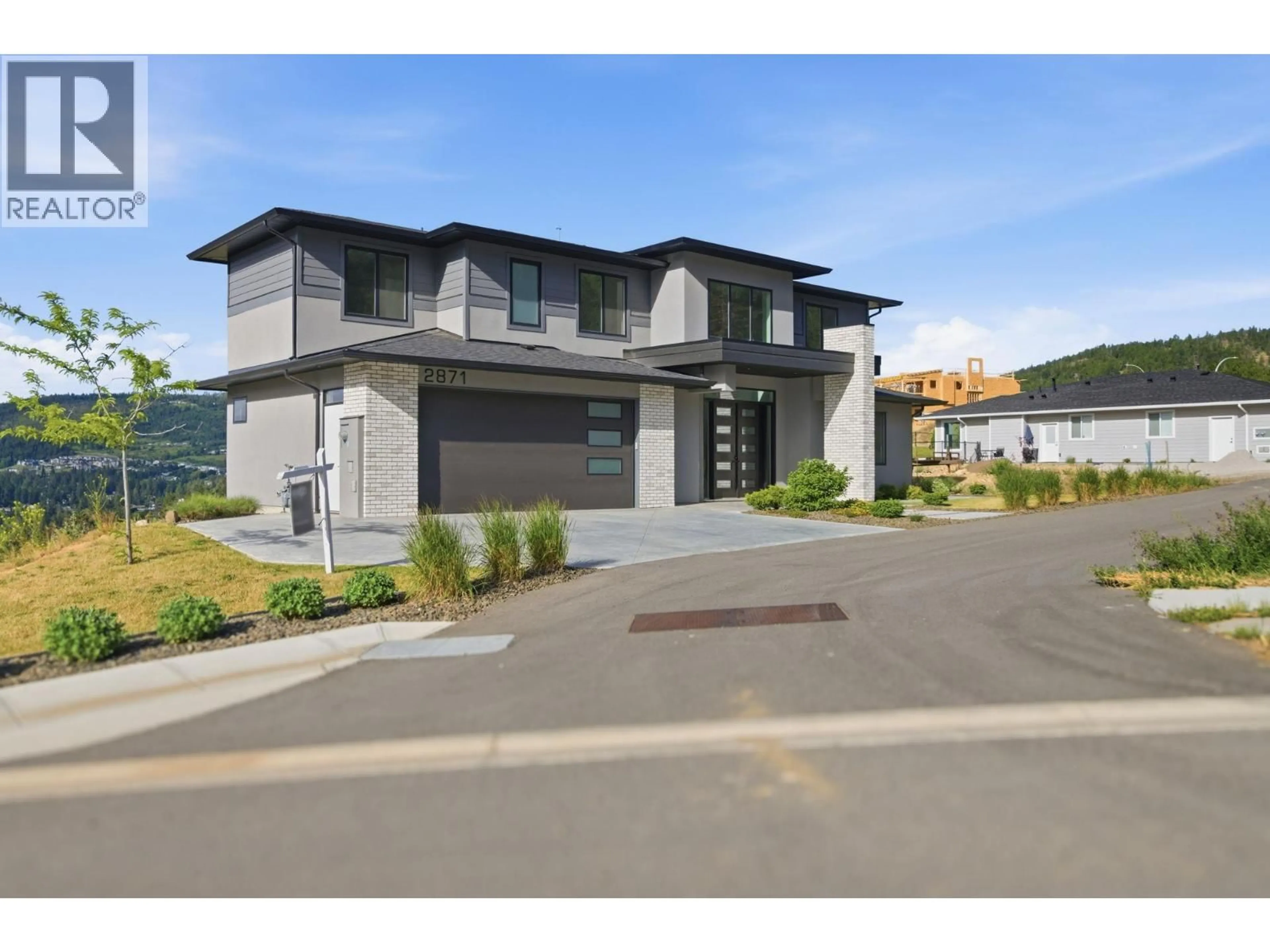 Home with vinyl exterior material, street for 2871 COPPER RIDGE DRIVE, West Kelowna British Columbia V4T0E7