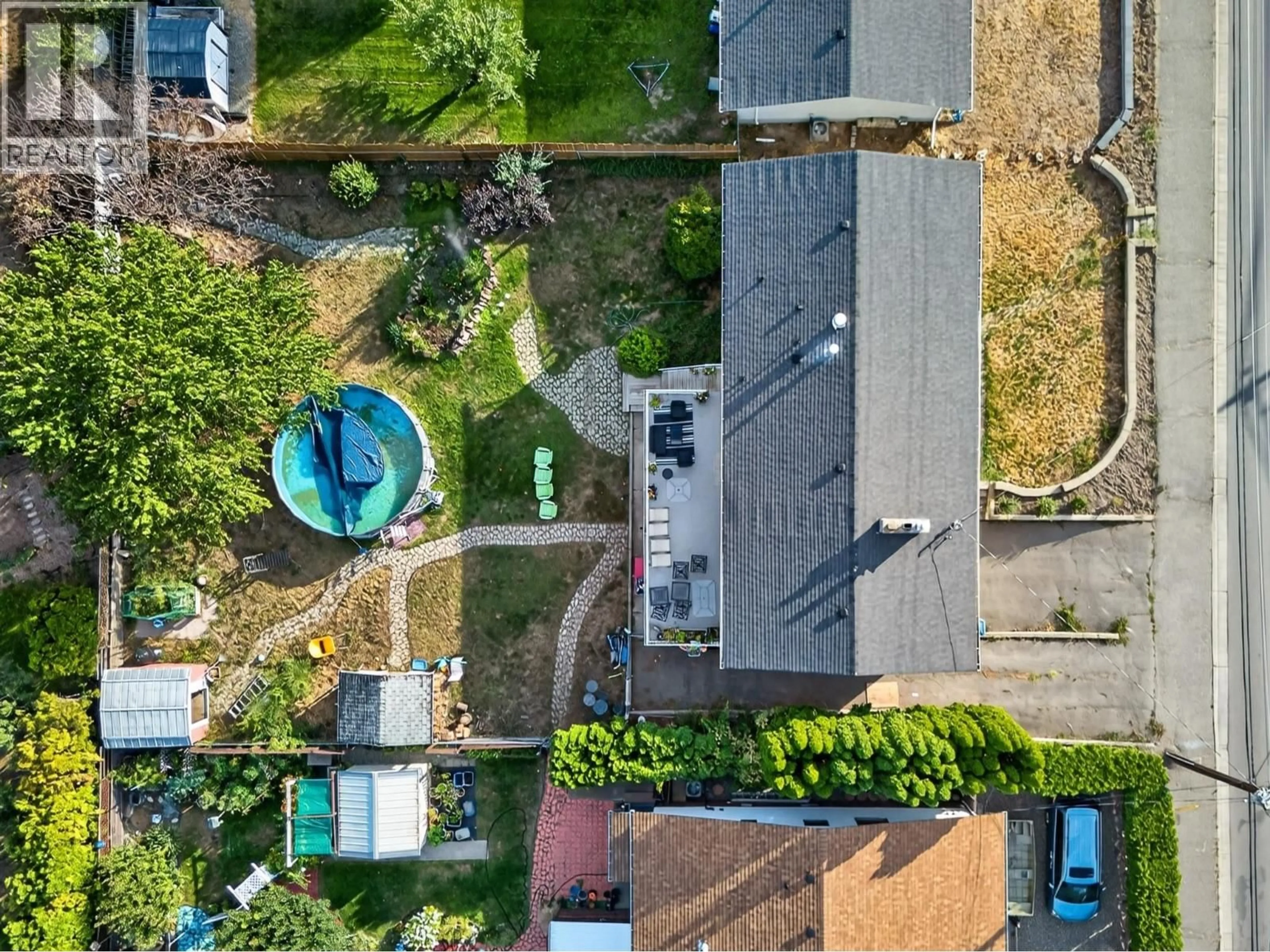 A pic from outside/outdoor area/front of a property/back of a property/a pic from drone, unknown for 3575 WESTSYDE ROAD, Kamloops British Columbia V2B7H5