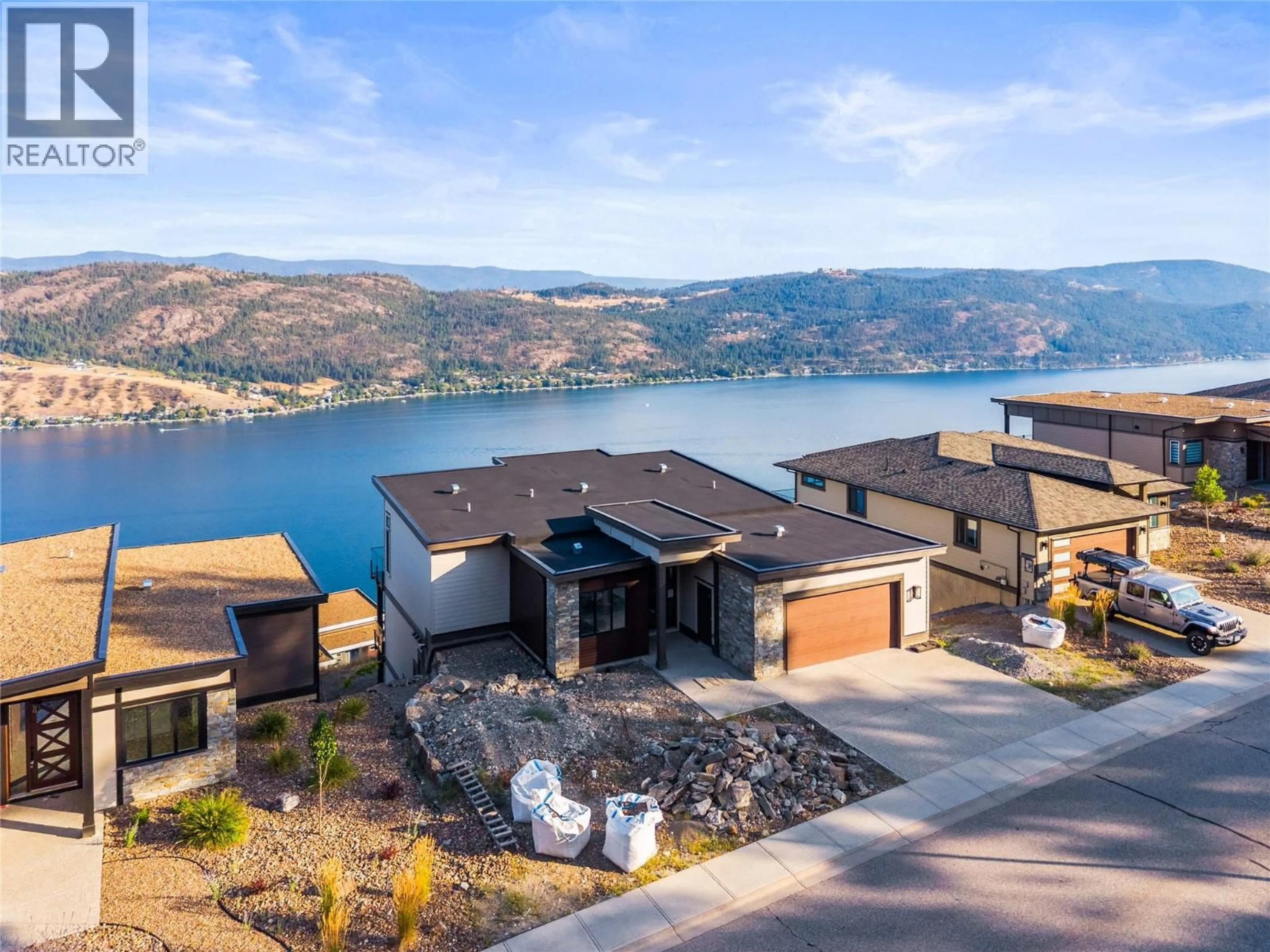 A pic from outside/outdoor area/front of a property/back of a property/a pic from drone, water/lake/river/ocean view for 8940 TAVISTOCK ROAD, Vernon British Columbia V1H2L4