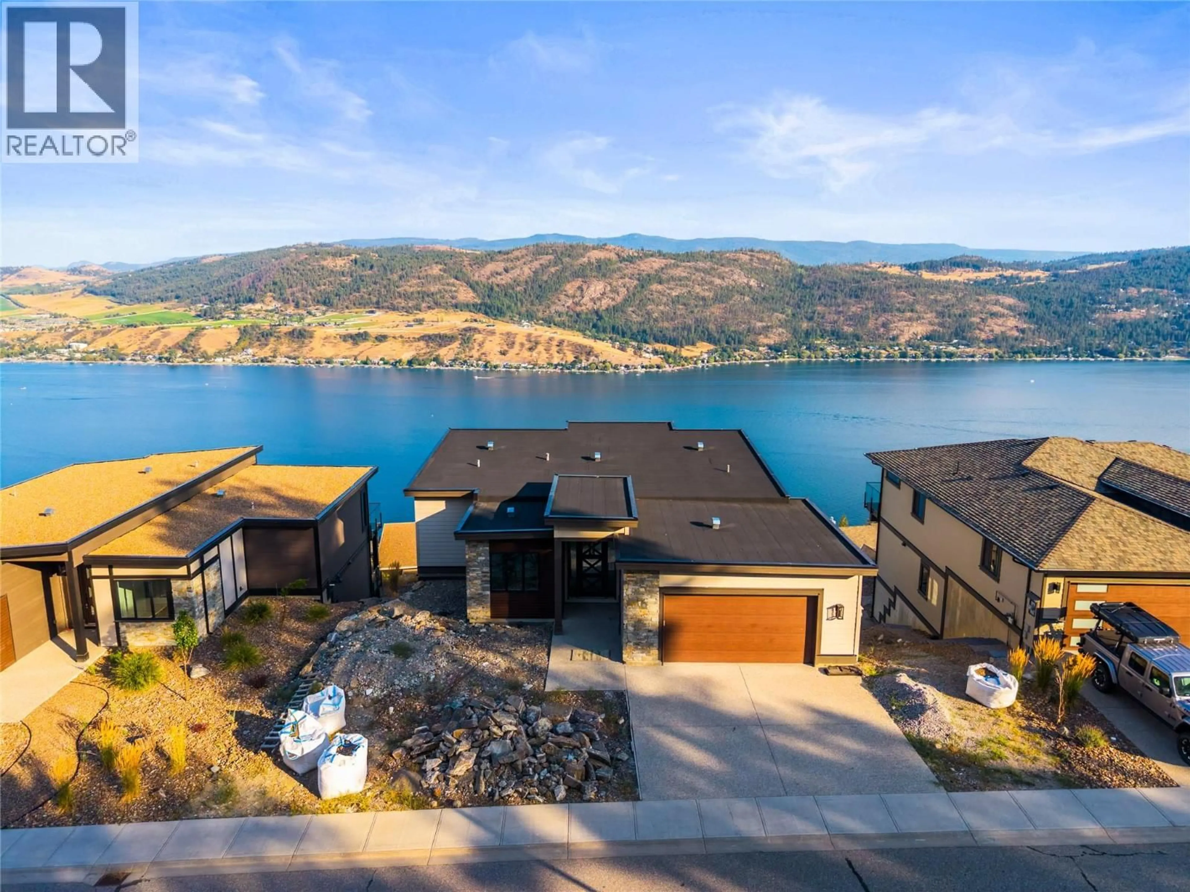 A pic from outside/outdoor area/front of a property/back of a property/a pic from drone, water/lake/river/ocean view for 8940 TAVISTOCK ROAD, Vernon British Columbia V1H2L4
