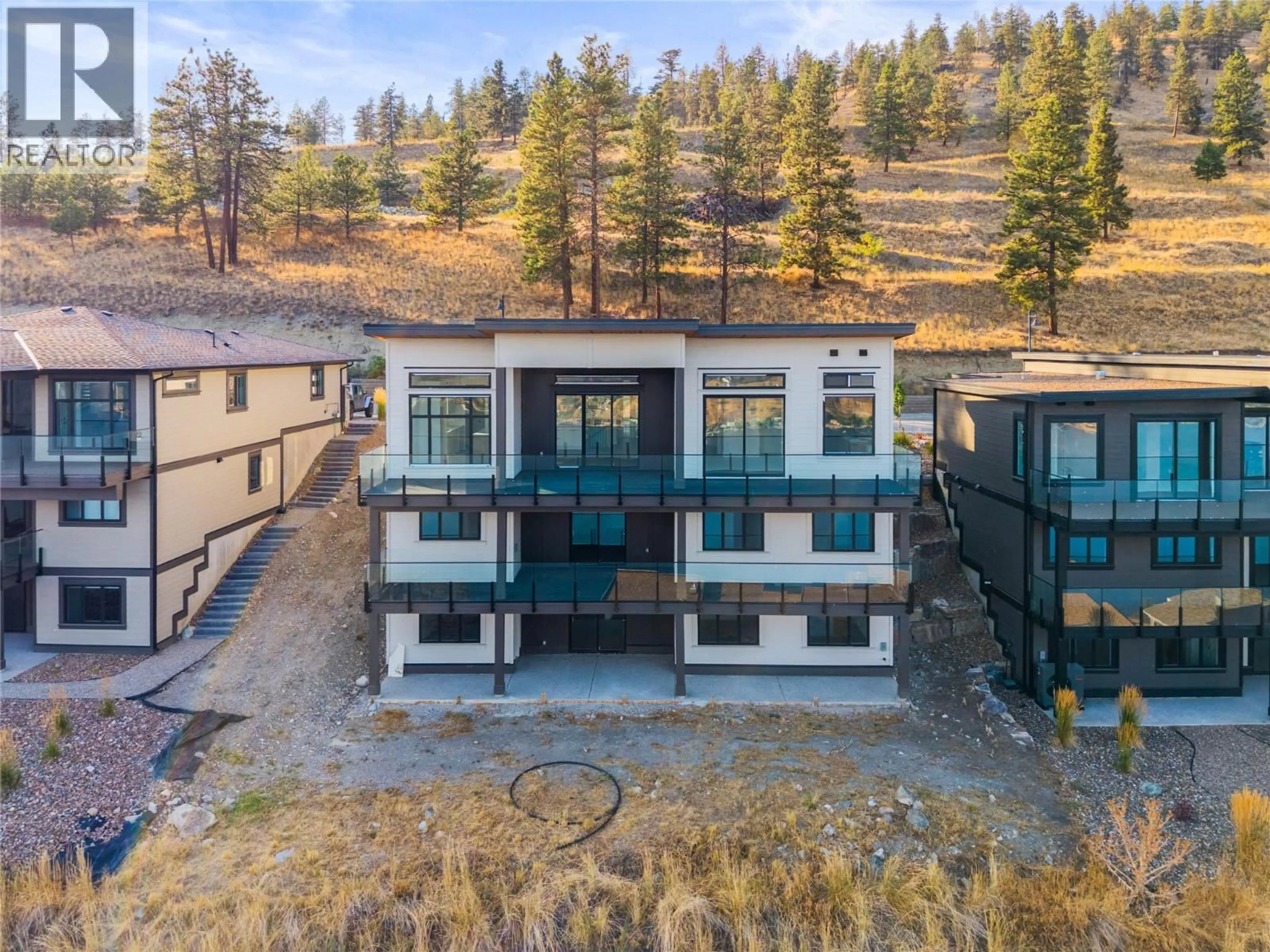 A pic from outside/outdoor area/front of a property/back of a property/a pic from drone, unknown for 8940 TAVISTOCK ROAD, Vernon British Columbia V1H2L4