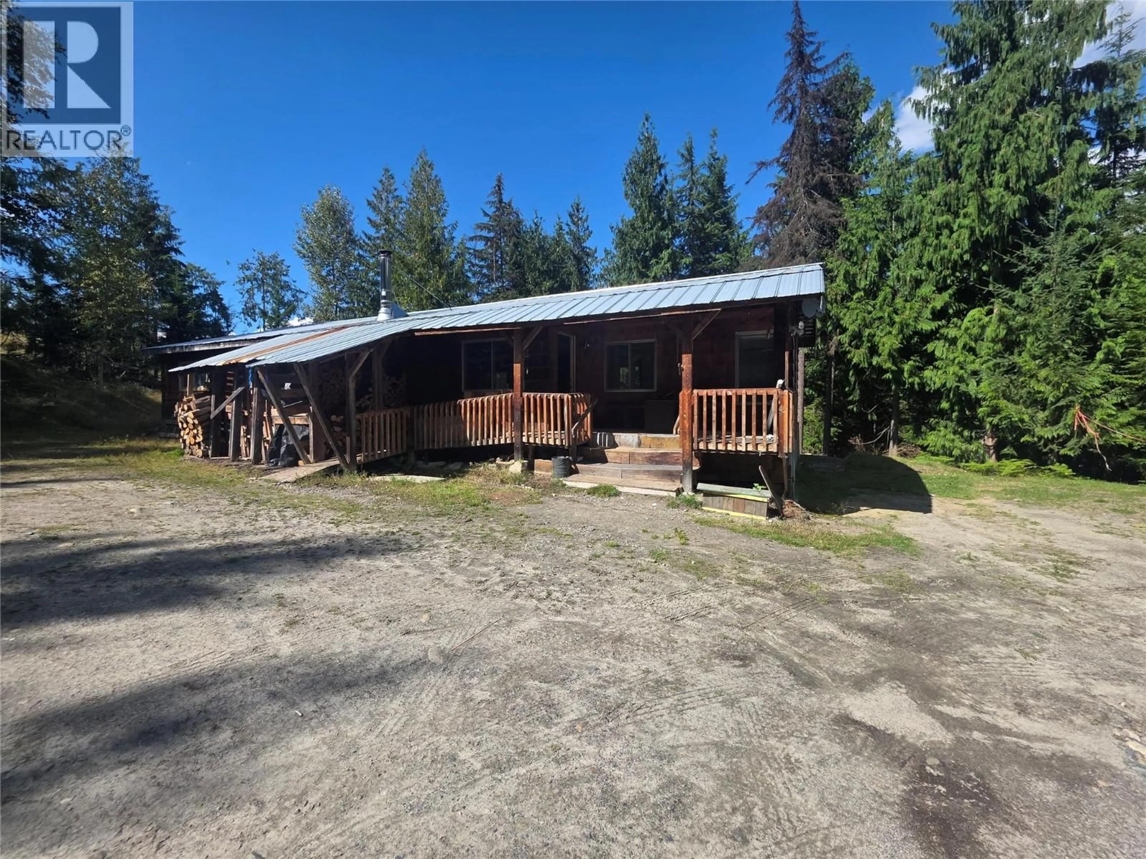 A pic from outside/outdoor area/front of a property/back of a property/a pic from drone, building for 478 BROUSE LOOP ROAD, Nakusp British Columbia V0G1R1