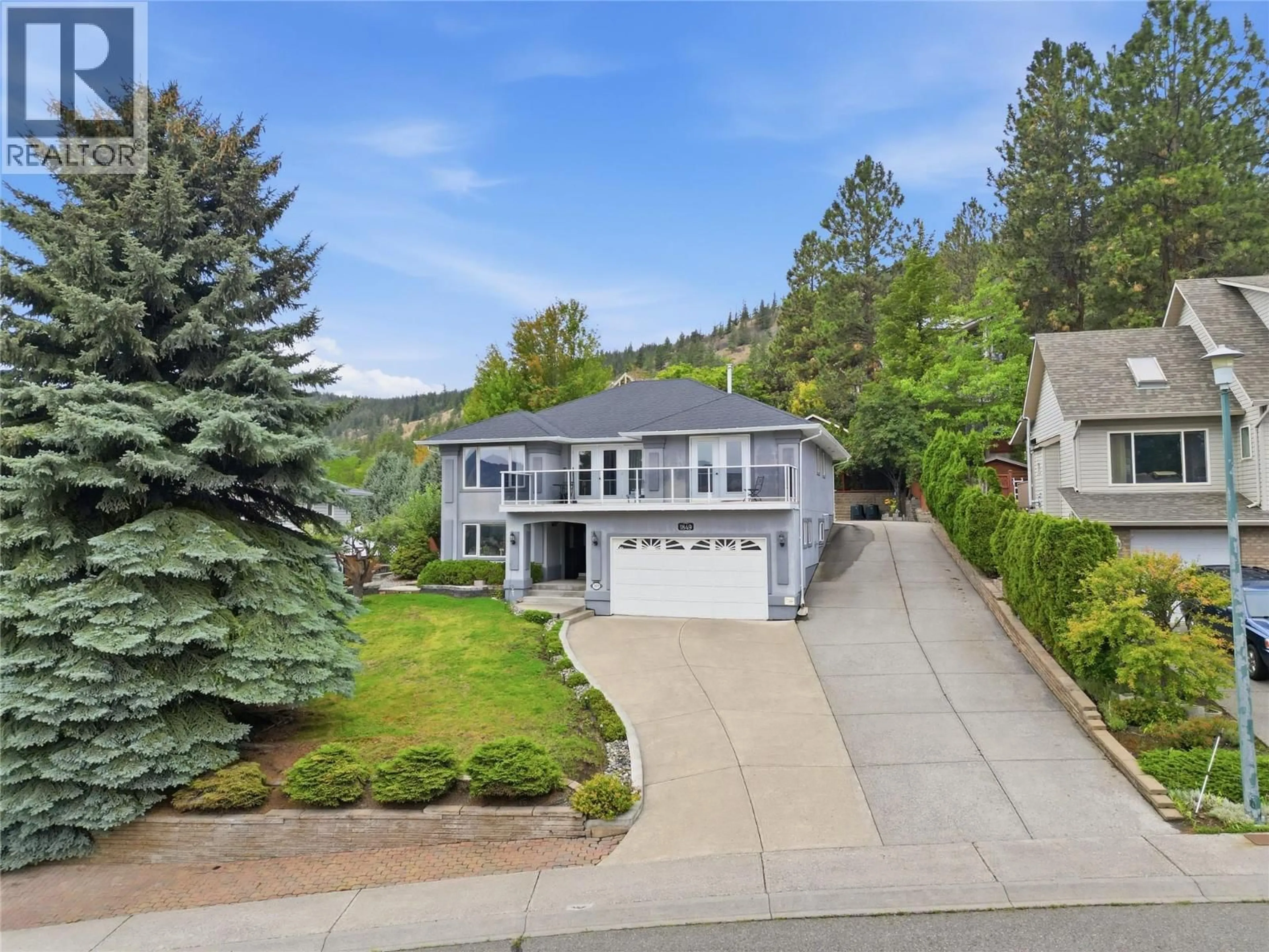 A pic from outside/outdoor area/front of a property/back of a property/a pic from drone, unknown for 1849 PINERIDGE DRIVE, Merritt British Columbia V1K1J5