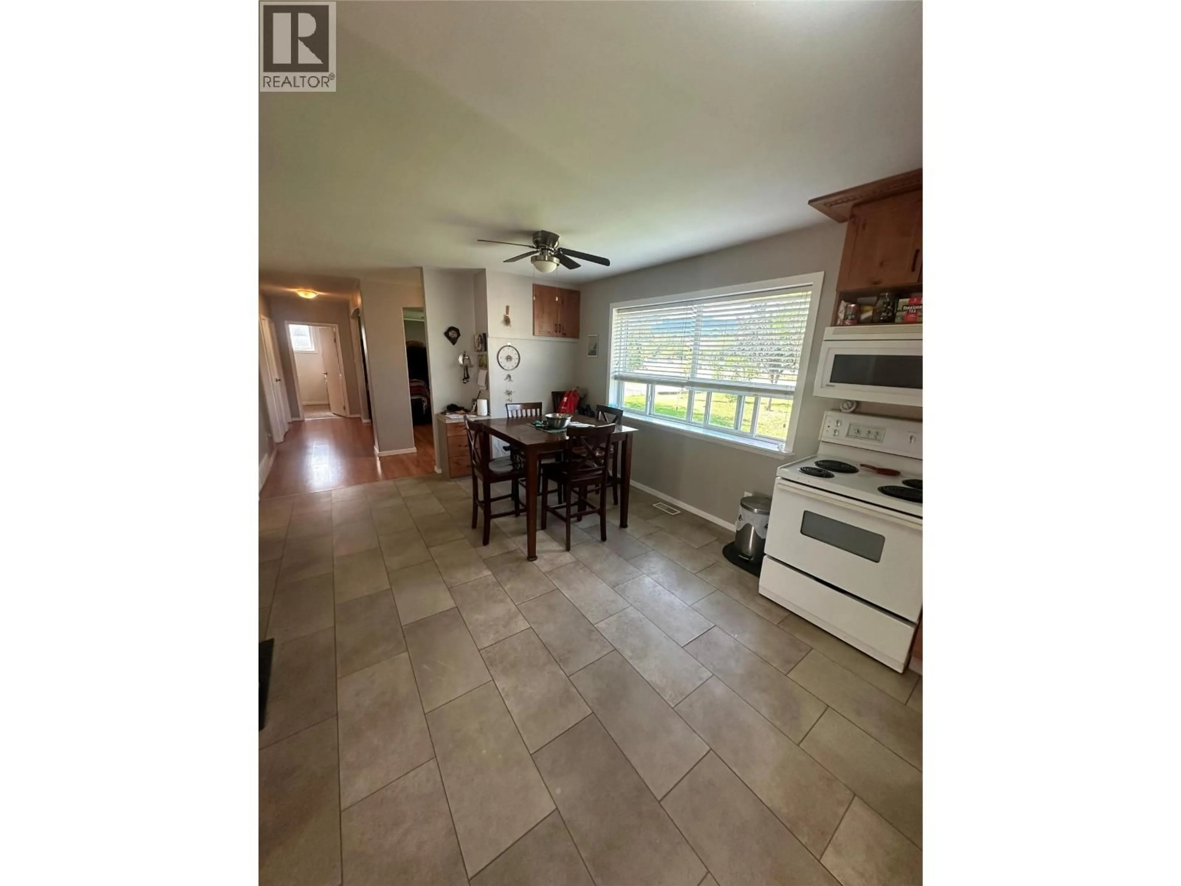 Open concept kitchen, ceramic/tile floor for 4704 NICHOLSON ROAD, Chetwynd British Columbia V0C1J0