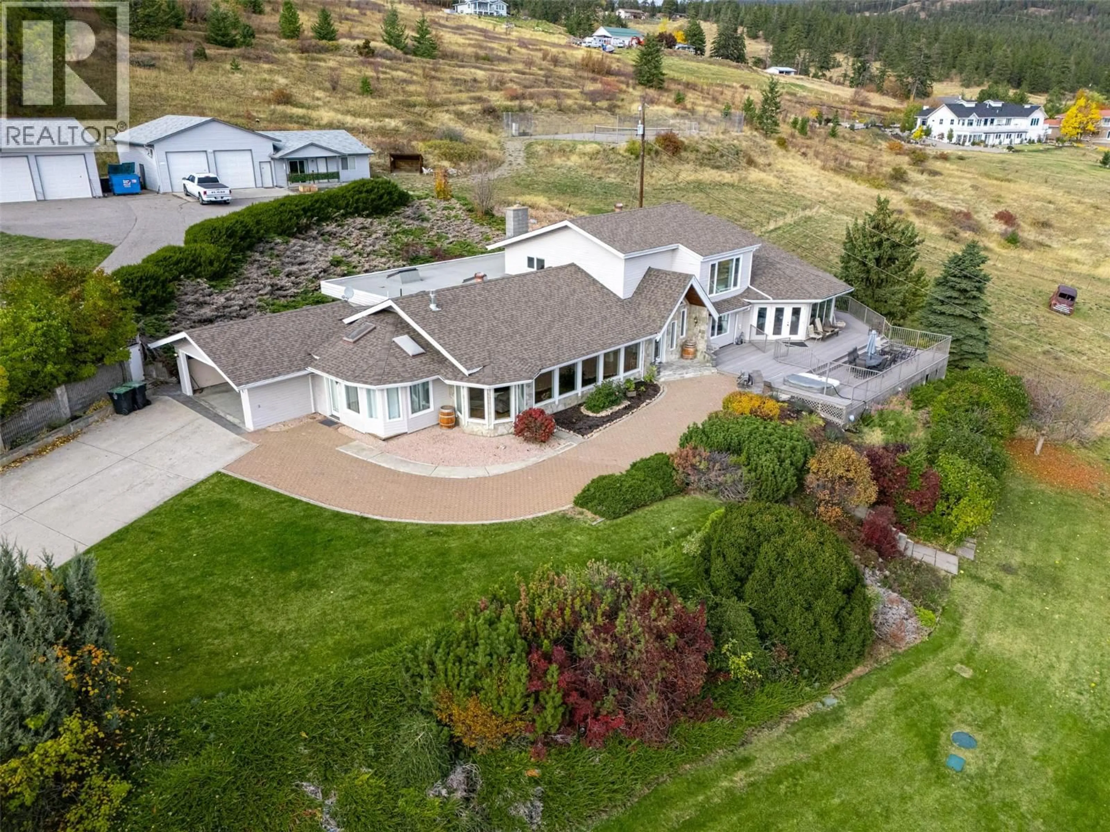 A pic from outside/outdoor area/front of a property/back of a property/a pic from drone, mountain view for 3510 GATES ROAD, West Kelowna British Columbia V4T1A2