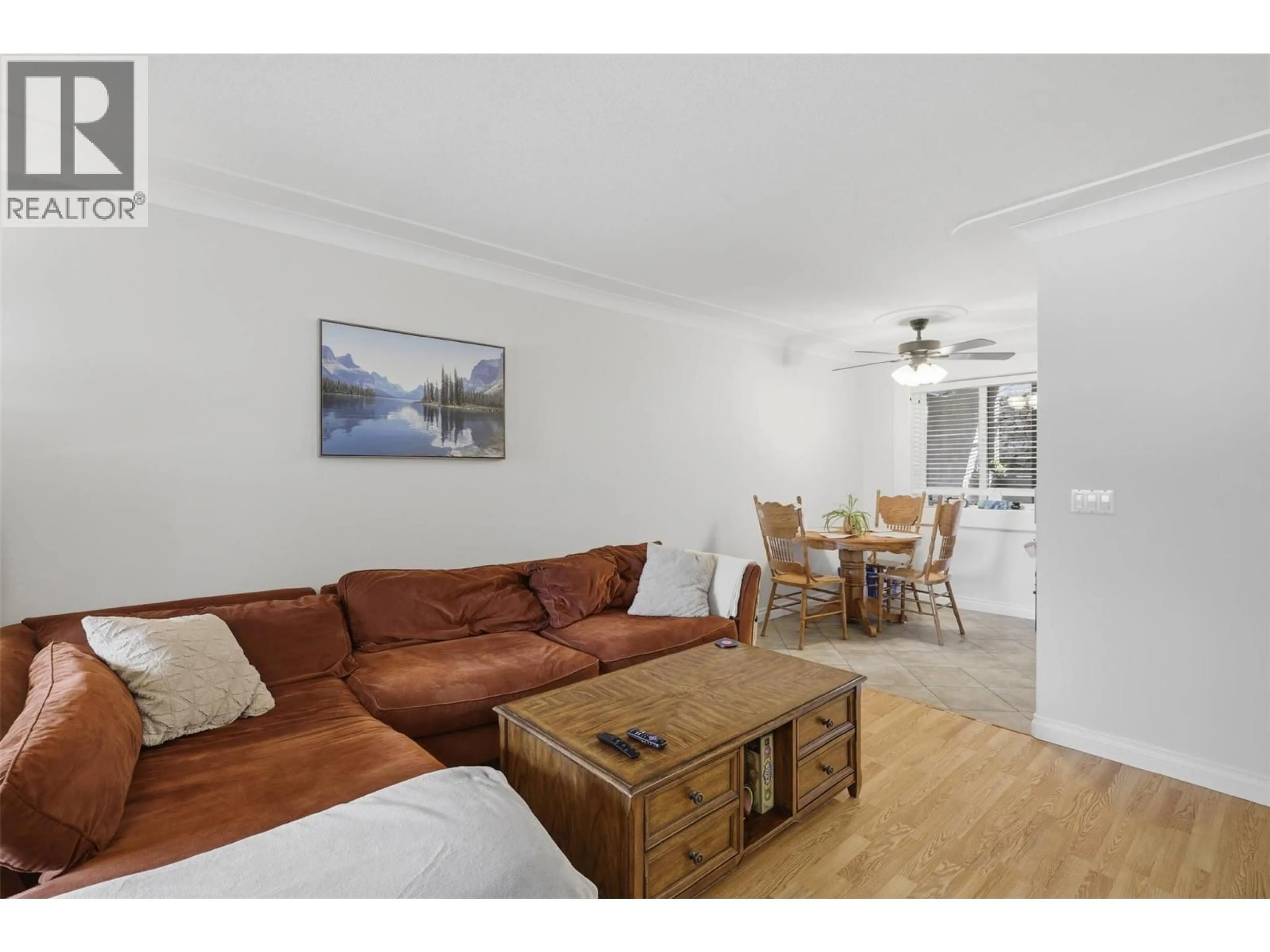 Living room with furniture, wood/laminate floor for 102 - 1185 HUGH ALLAN DRIVE, Kamloops British Columbia V1S1T3