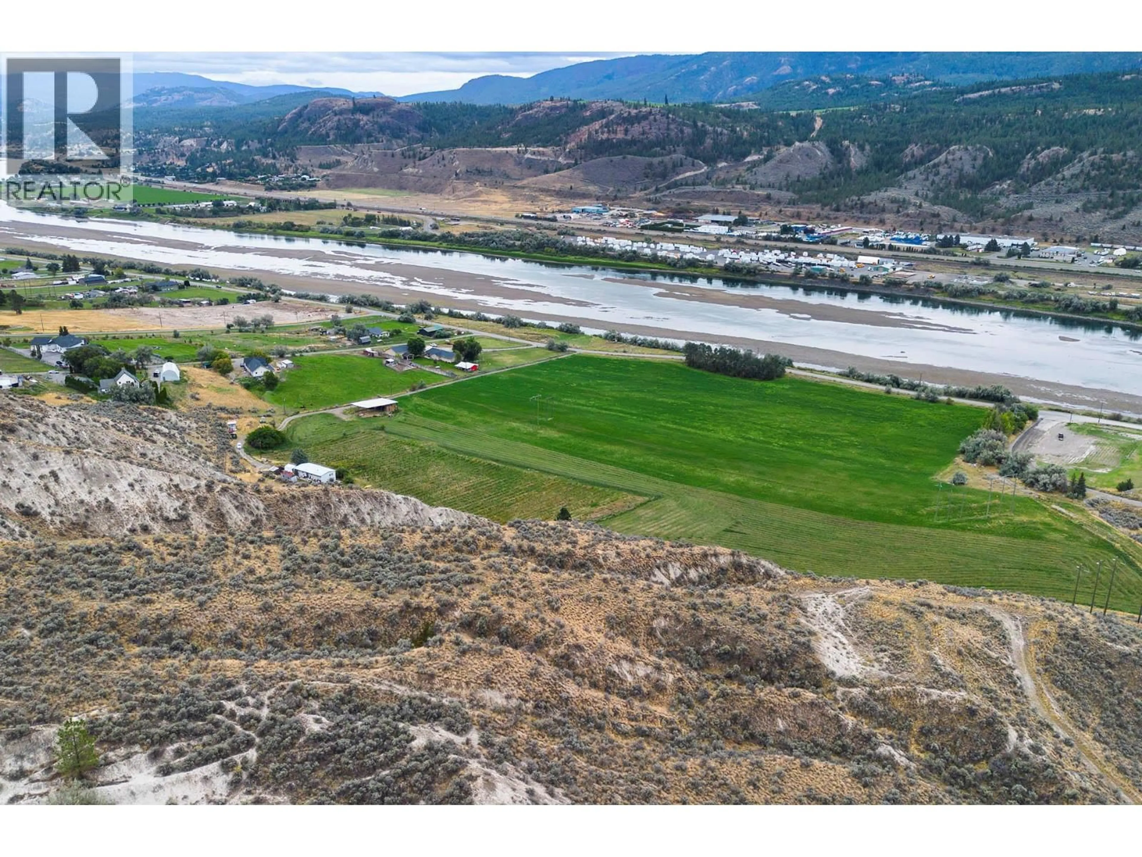 A pic from outside/outdoor area/front of a property/back of a property/a pic from drone, water/lake/river/ocean view for 3059 SHUSWAP E ROAD, Kamloops British Columbia V2H1T1