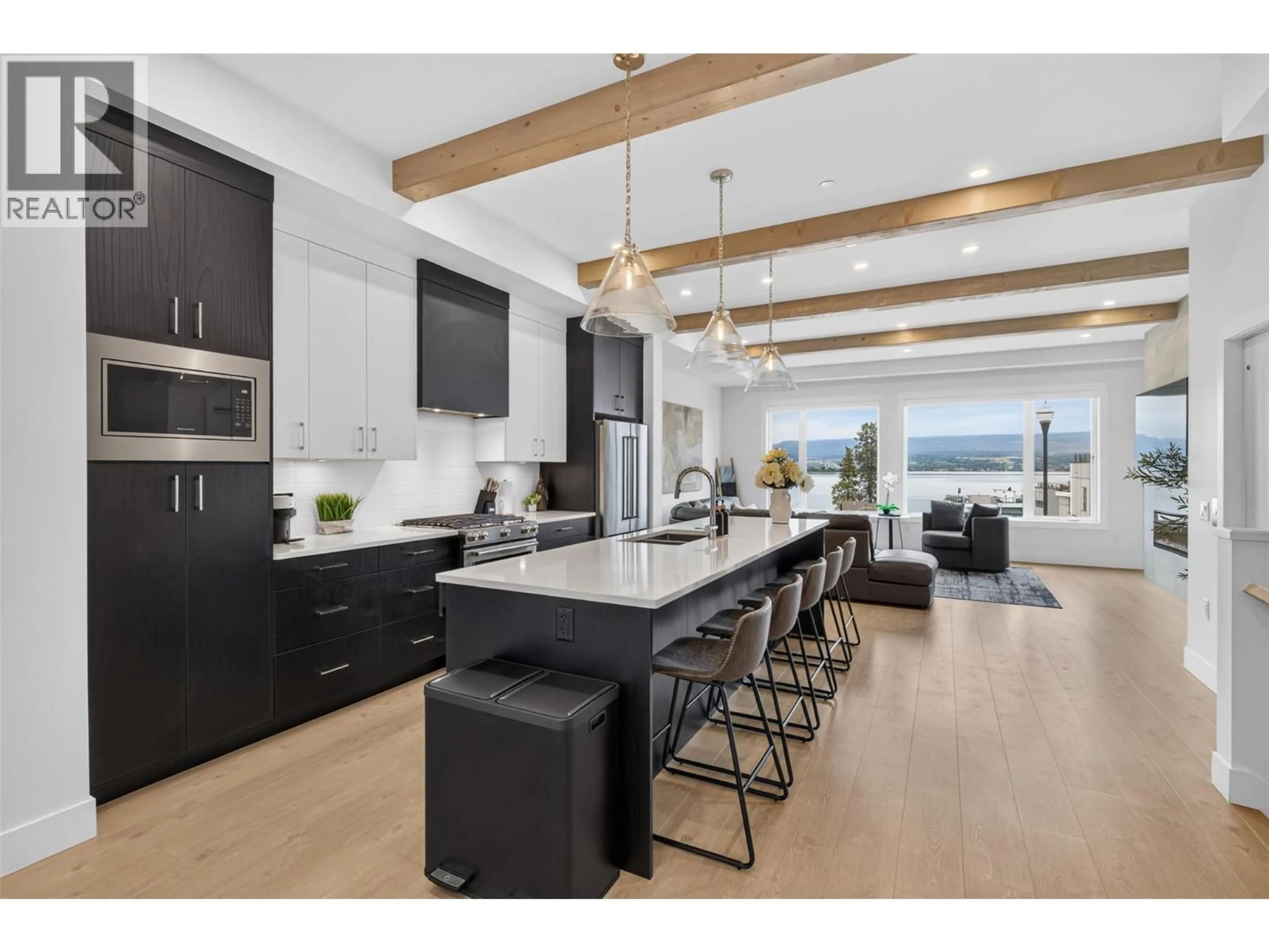 Open concept kitchen, wood/laminate floor for 103 - 2100 CAMPBELL PLACE, Westbank British Columbia V1Z1S9