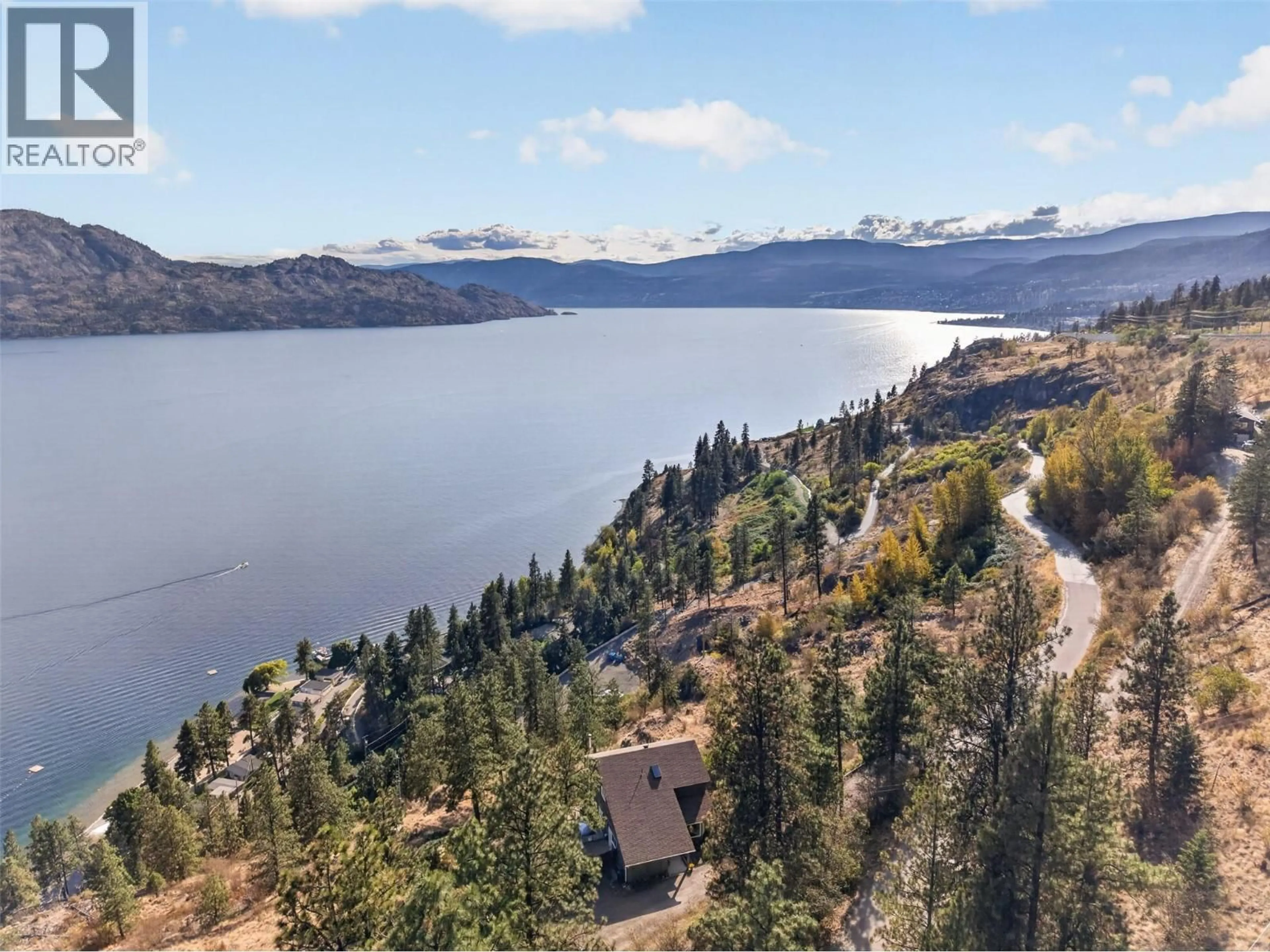 A pic from outside/outdoor area/front of a property/back of a property/a pic from drone, water/lake/river/ocean view for 3040 SECLUSION BAY ROAD, West Kelowna British Columbia V4T1W5
