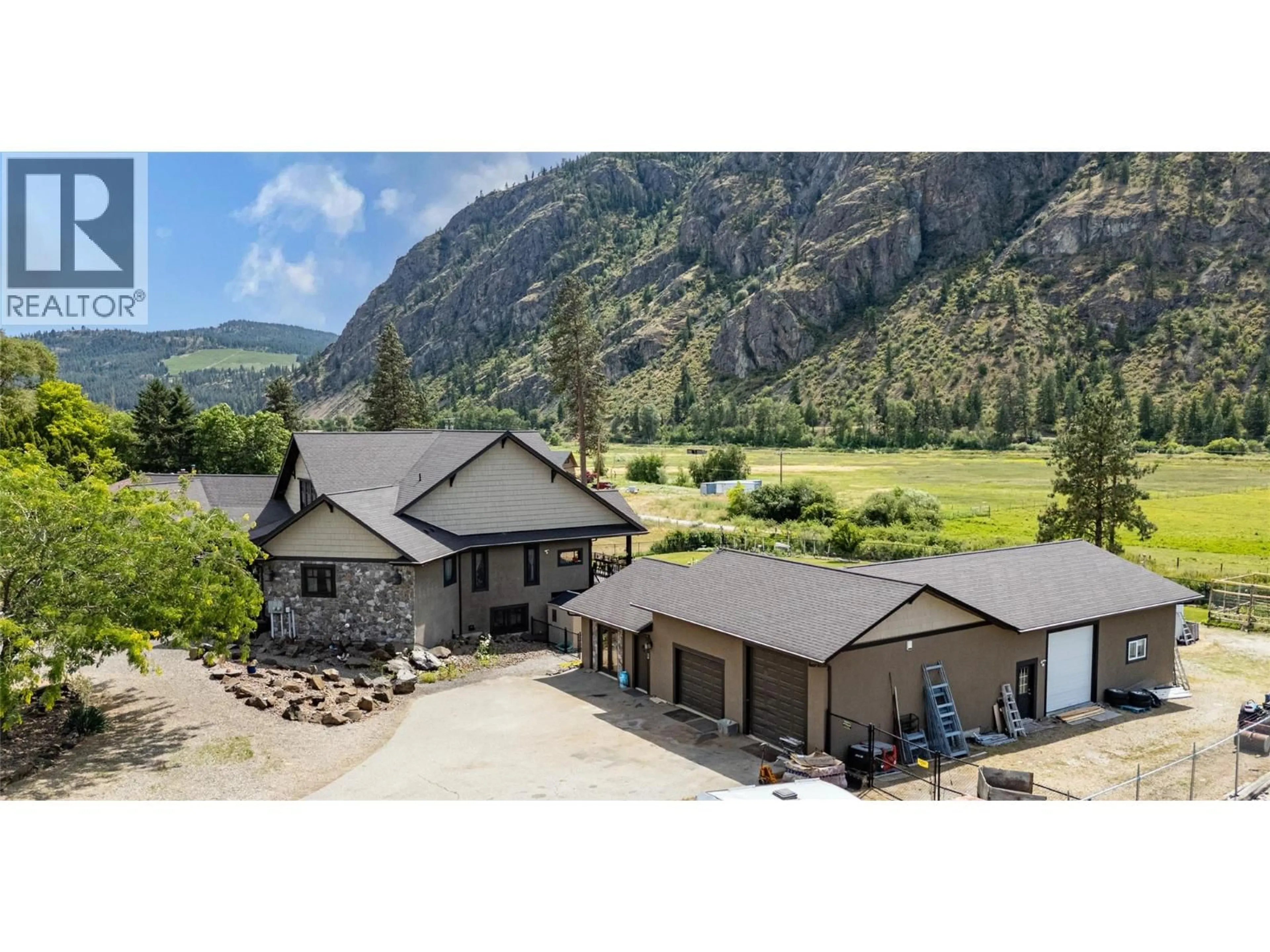 A pic from outside/outdoor area/front of a property/back of a property/a pic from drone, mountain view for 1788 ALBA ROAD, Okanagan Falls British Columbia V0H1R2