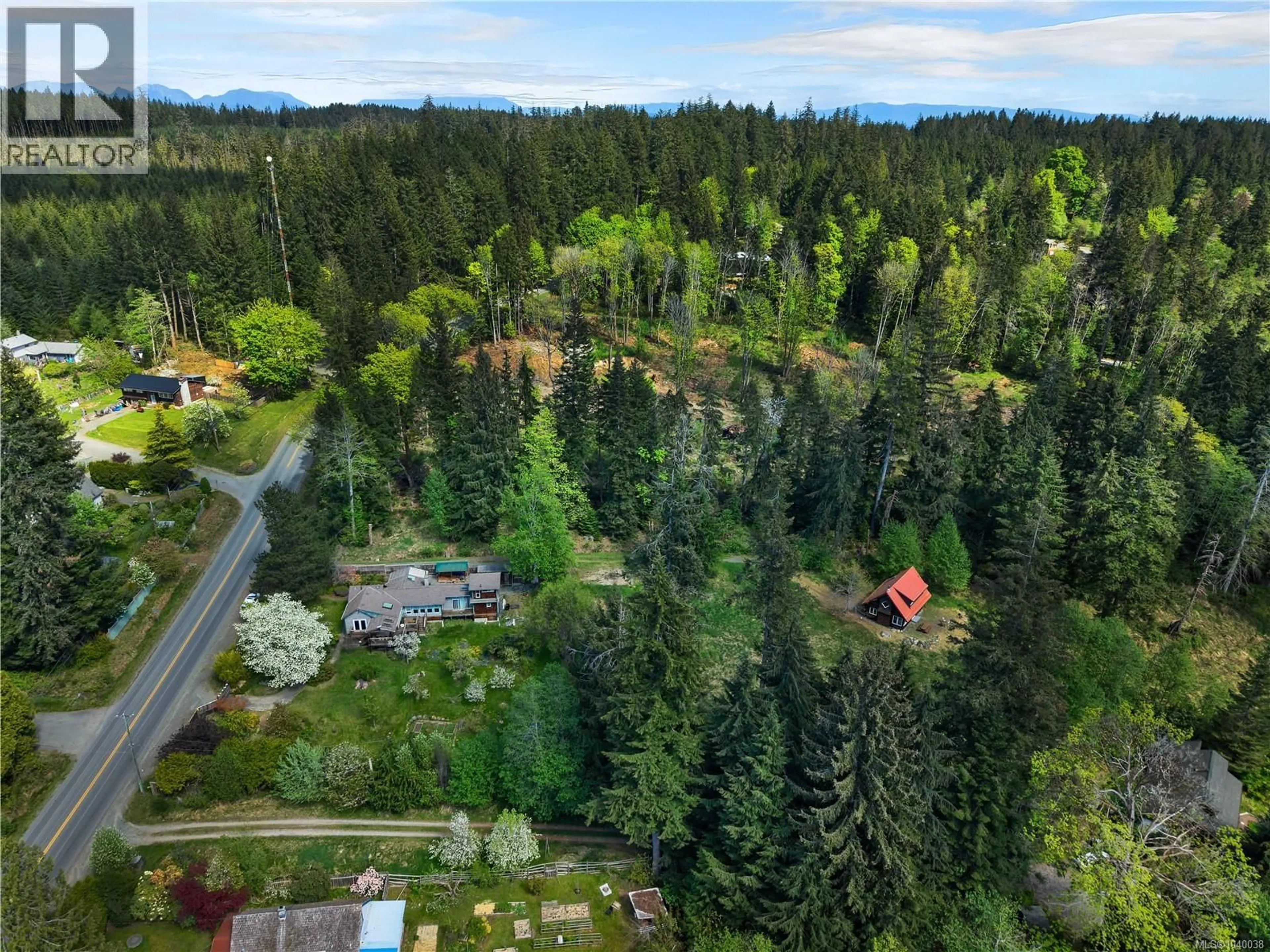A pic from outside/outdoor area/front of a property/back of a property/a pic from drone, forest/trees view for 653 HERIOT BAY ROAD, Quadra Island British Columbia V0P1N0