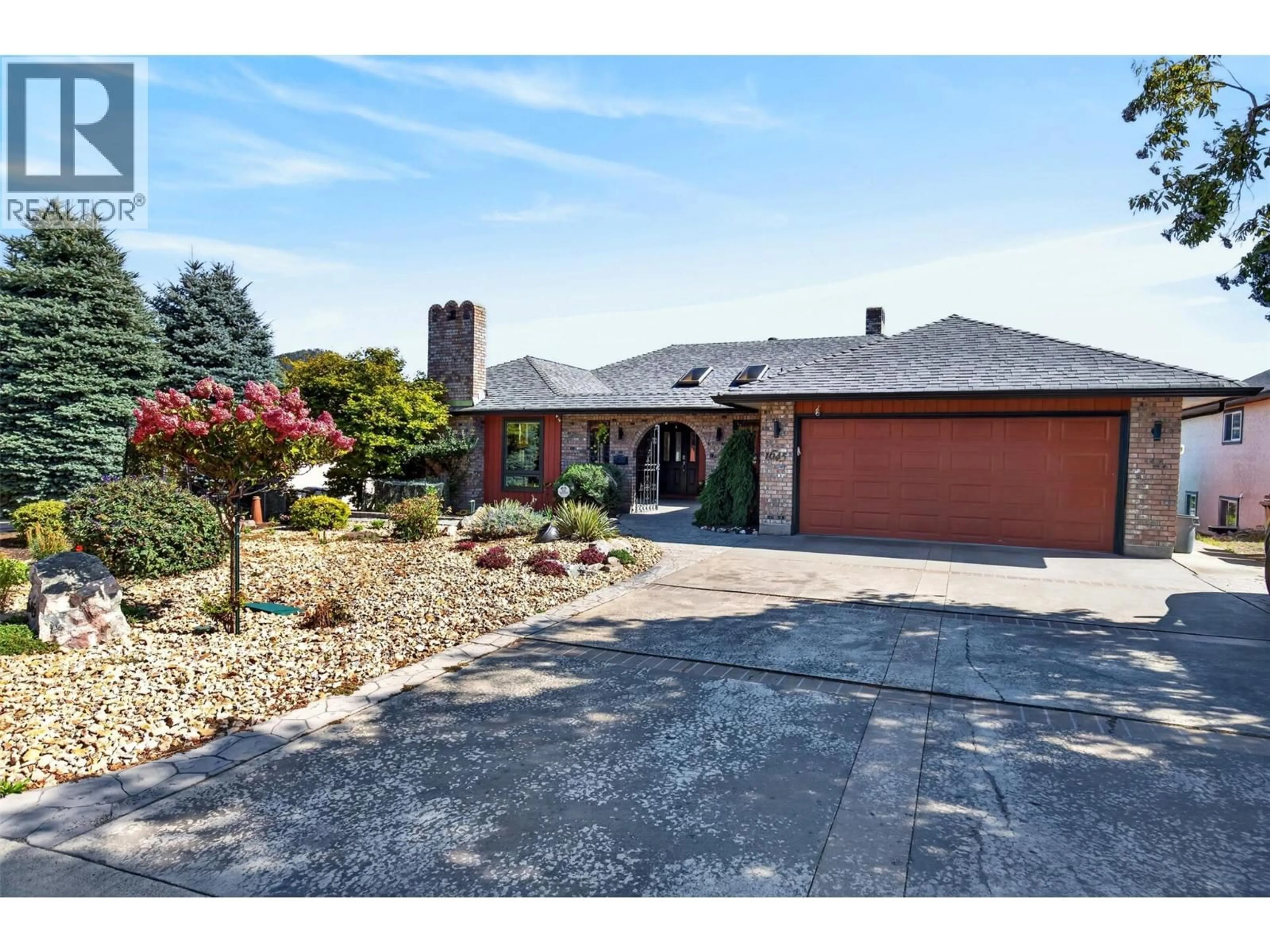 Home with brick exterior material, street for 1645 SMITHSON PLACE, Kelowna British Columbia V1Y8N5