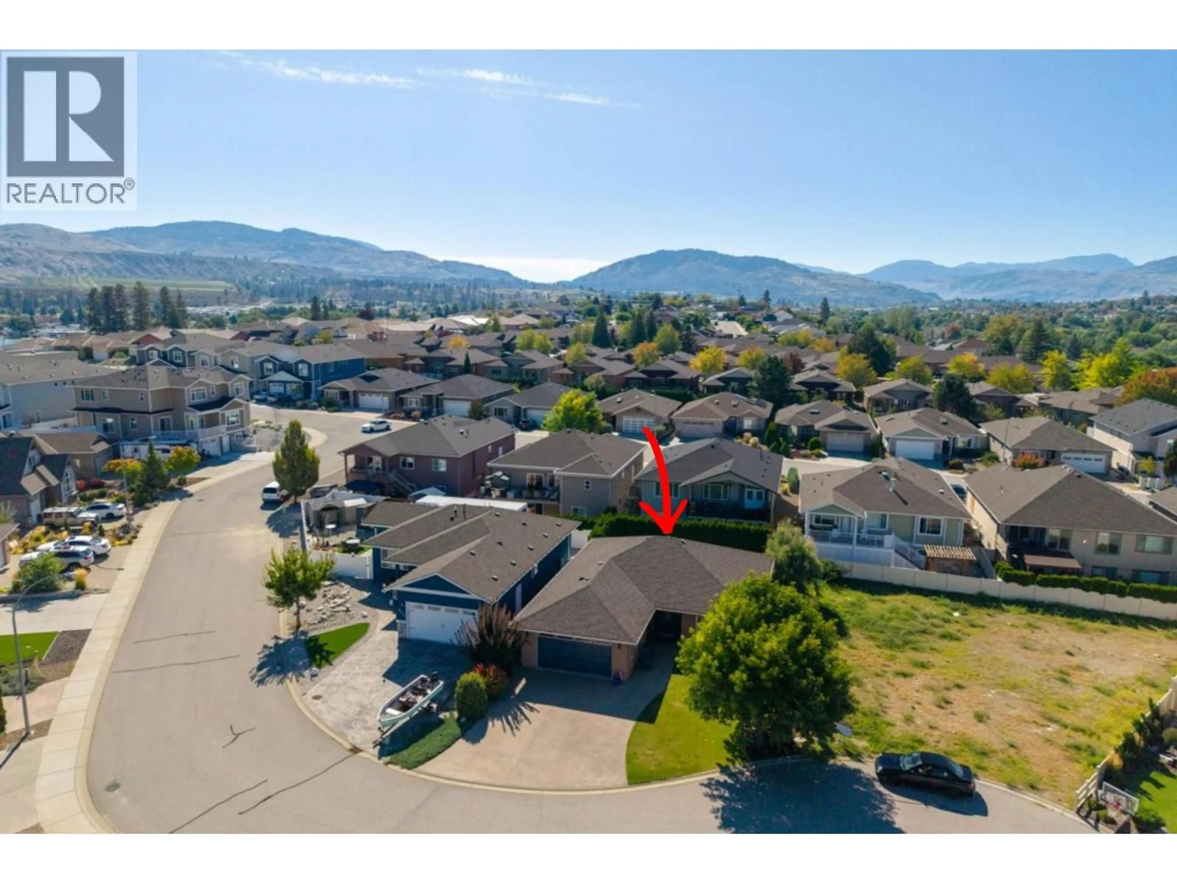 A pic from outside/outdoor area/front of a property/back of a property/a pic from drone, mountain view for 6960 CHARDONNAY PLACE, Oliver British Columbia V0H1T4