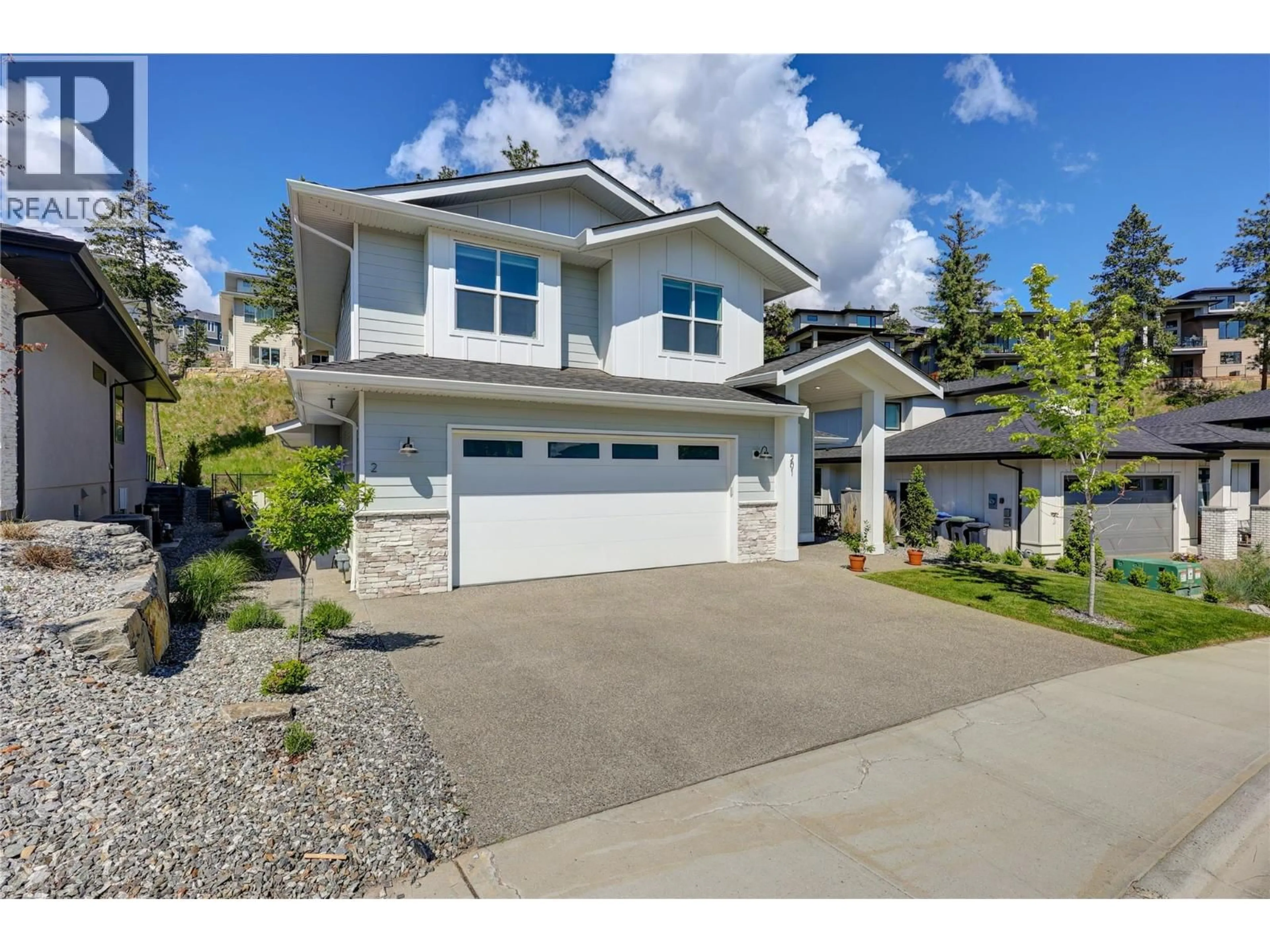 Home with vinyl exterior material, street for 201 SUMMER WOOD DRIVE, Kelowna British Columbia V1V0C9