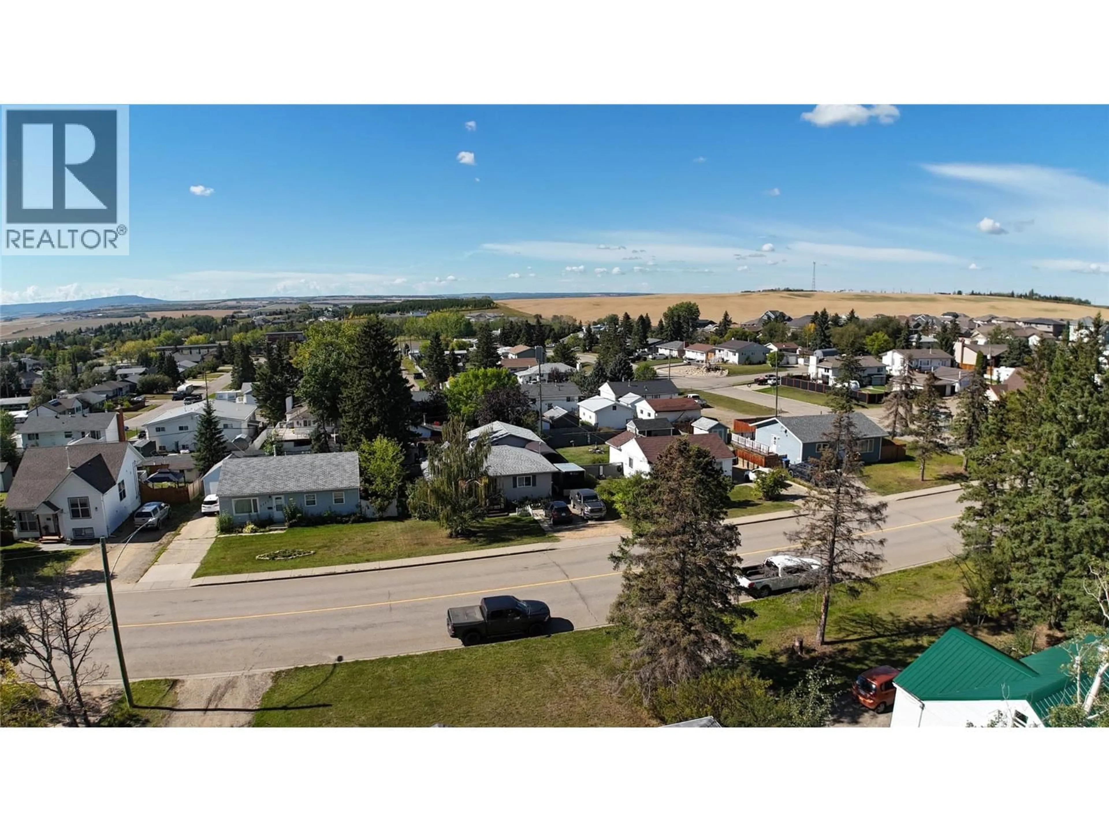 A pic from outside/outdoor area/front of a property/back of a property/a pic from drone, street for 9108 8 STREET, Dawson Creek British Columbia V1G3N4