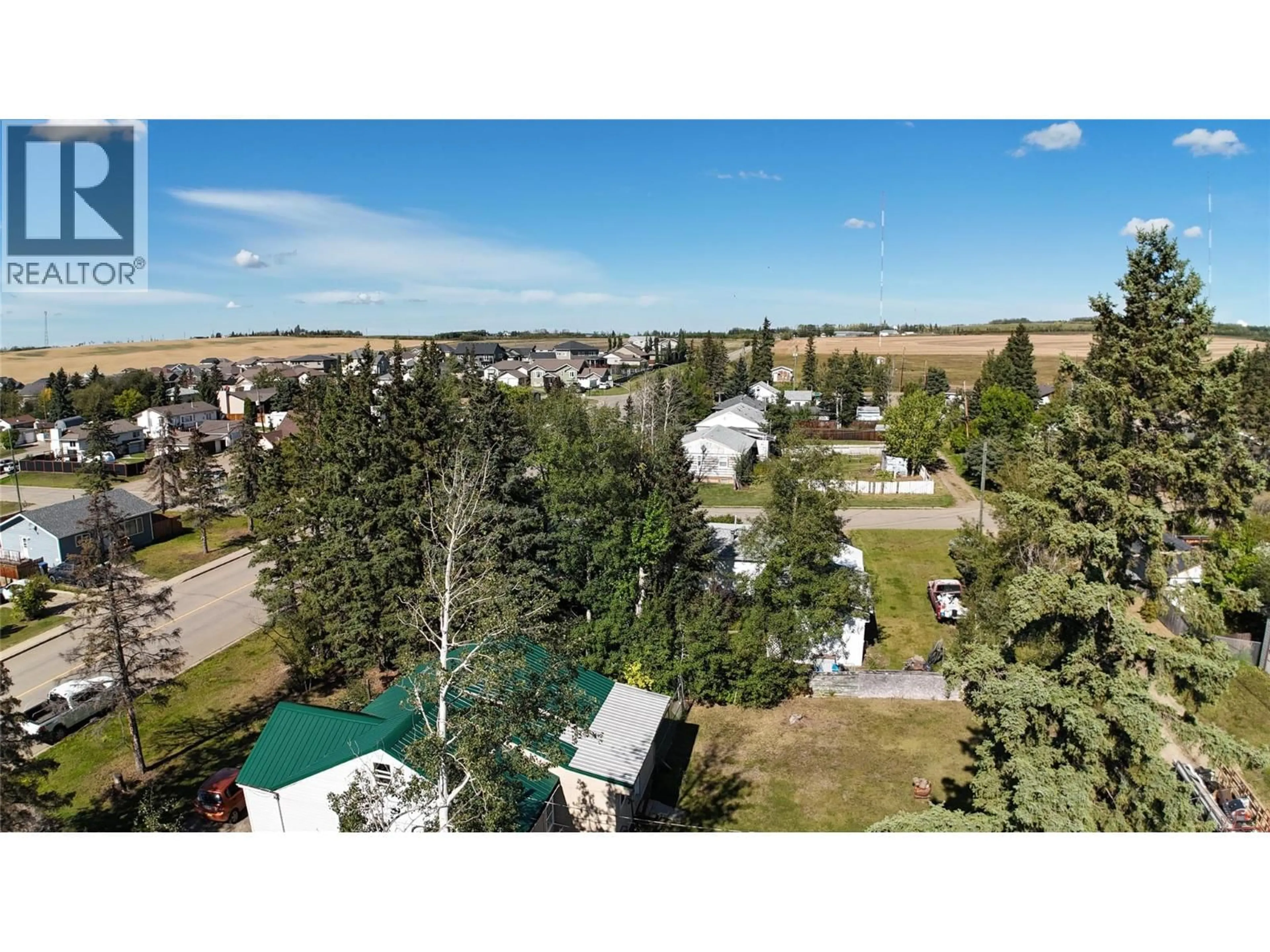 A pic from outside/outdoor area/front of a property/back of a property/a pic from drone, unknown for 9108 8 STREET, Dawson Creek British Columbia V1G3N4