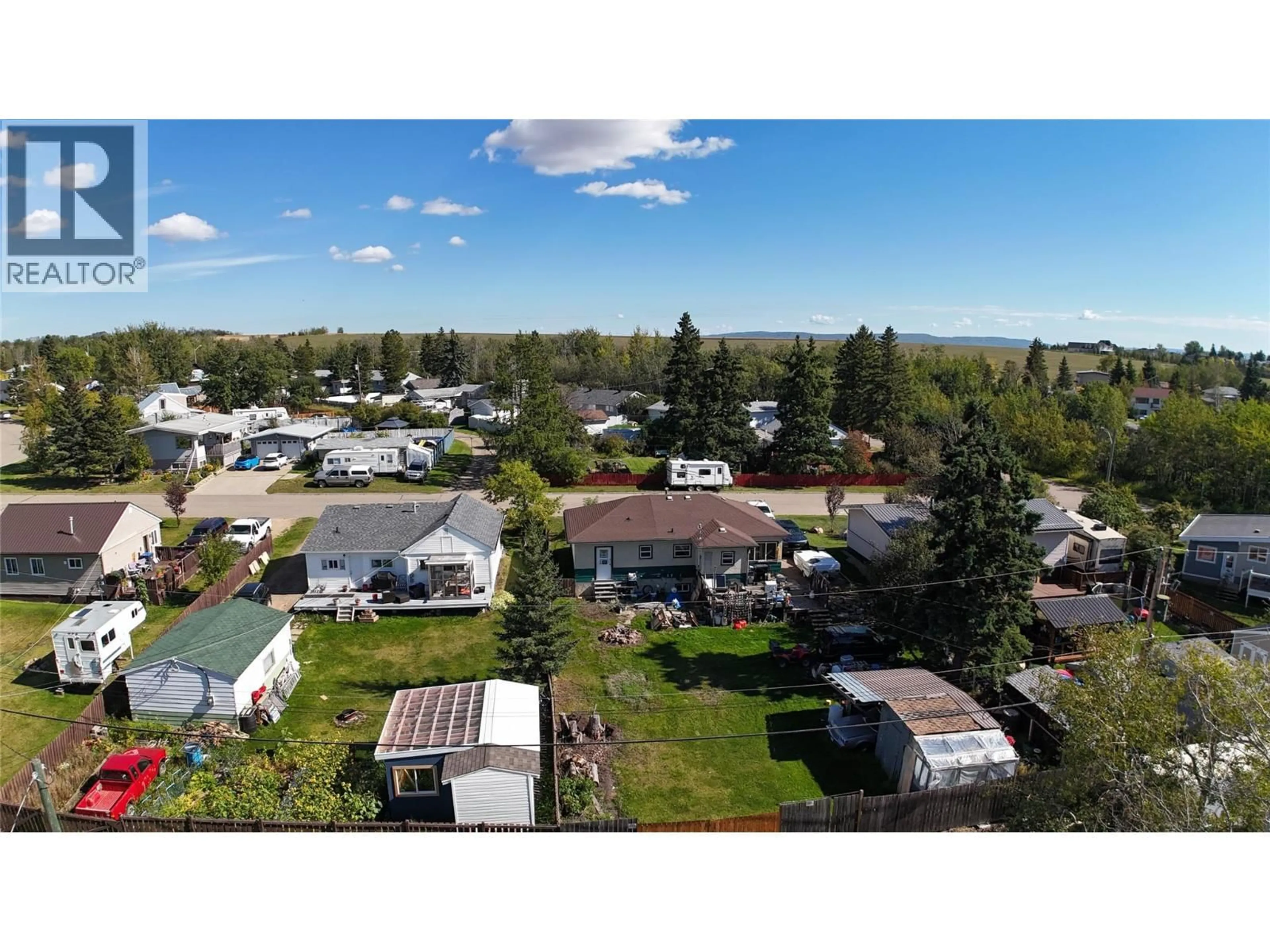 A pic from outside/outdoor area/front of a property/back of a property/a pic from drone, unknown for 9108 8 STREET, Dawson Creek British Columbia V1G3N4