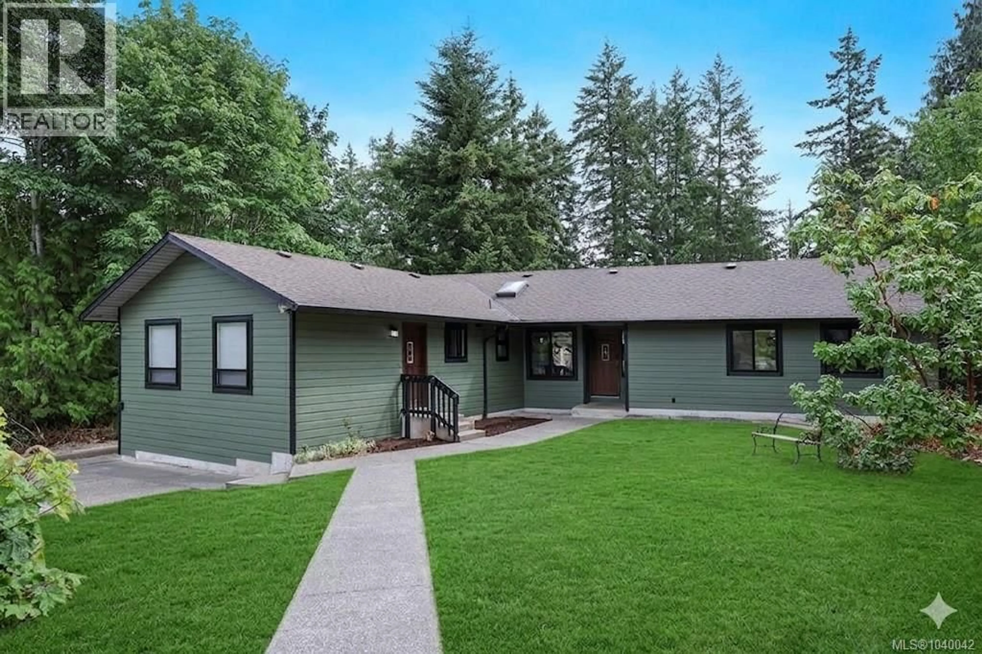 Home with vinyl exterior material, mountain view for 6585 WALKER FRONTAGE ROAD, Fanny Bay British Columbia V0R1W0