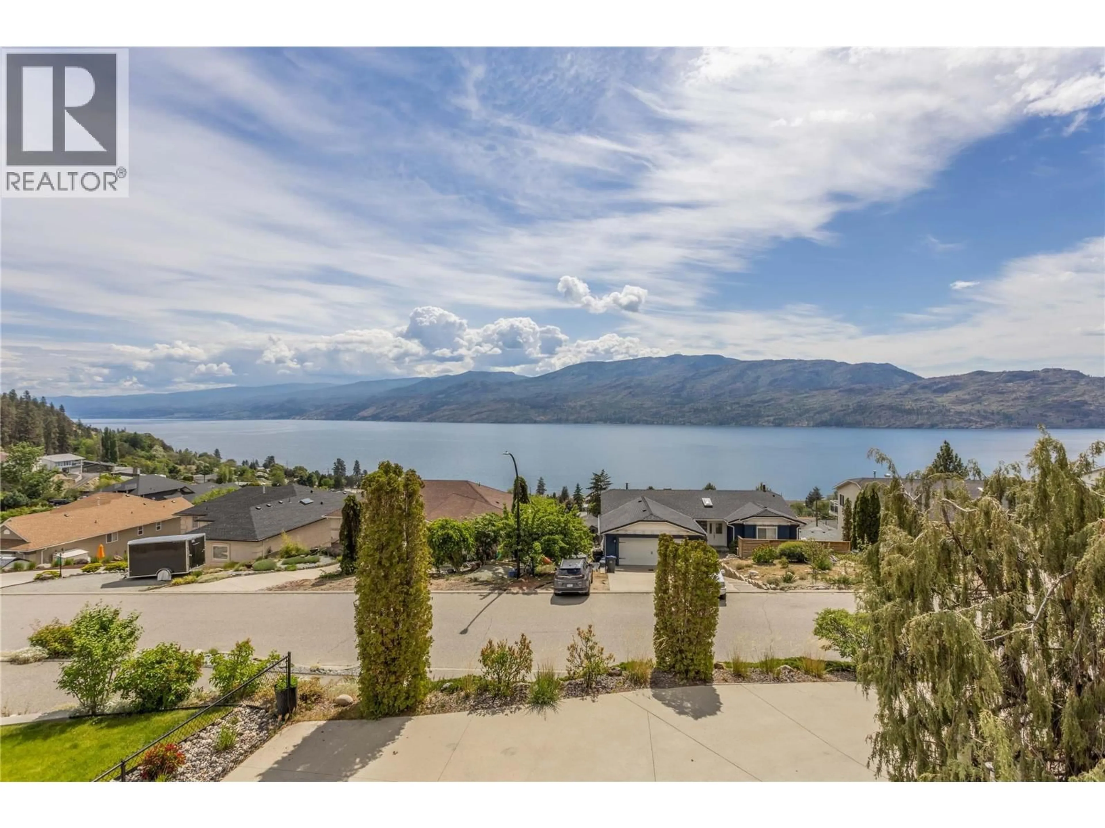 A pic from outside/outdoor area/front of a property/back of a property/a pic from drone, water/lake/river/ocean view for 5220 SUTHERLAND ROAD, Peachland British Columbia V0H1X0