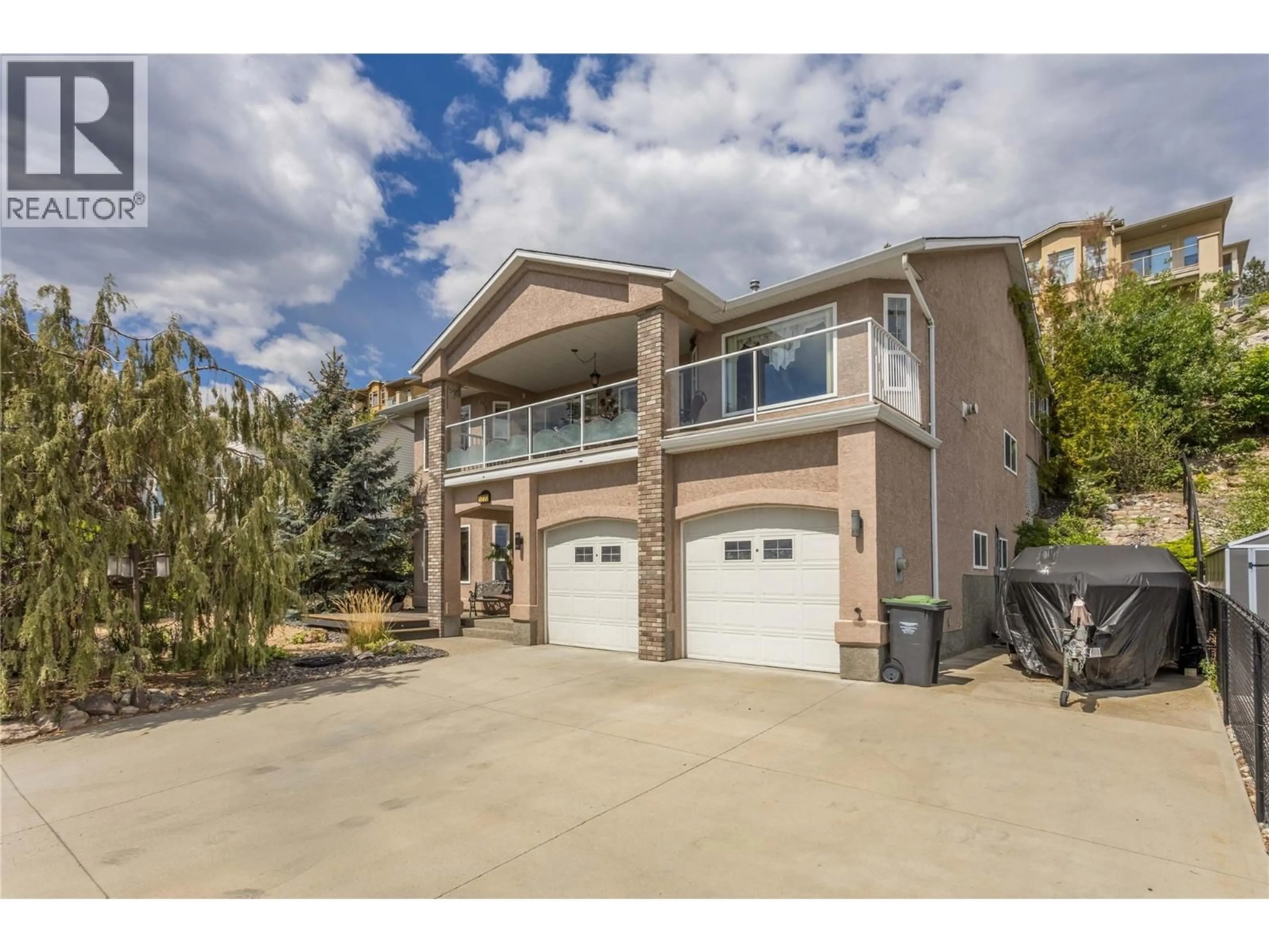 Home with vinyl exterior material, street for 5220 SUTHERLAND ROAD, Peachland British Columbia V0H1X0
