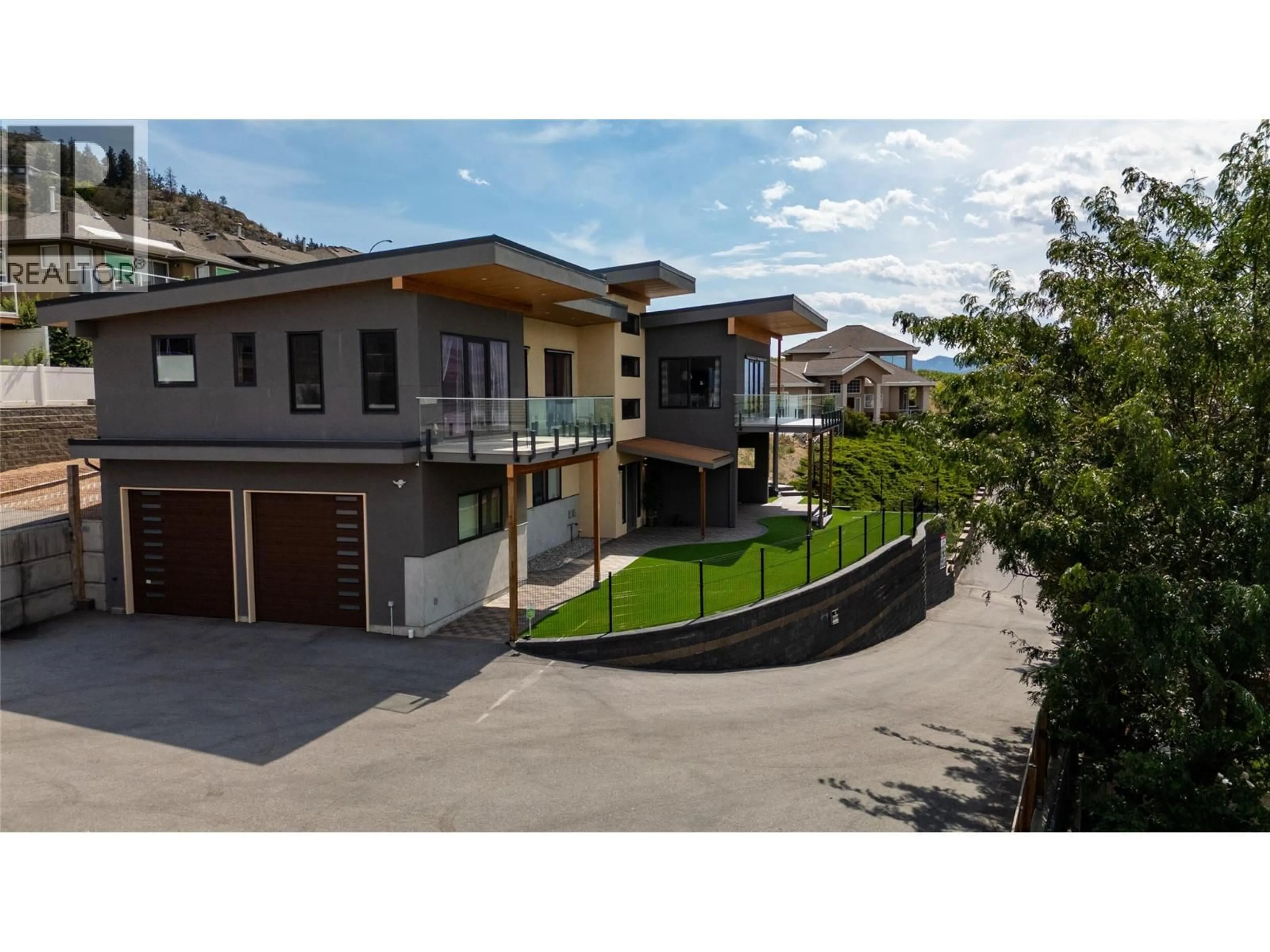 A pic from outside/outdoor area/front of a property/back of a property/a pic from drone, street for 3984 FINNERTY ROAD, Penticton British Columbia V2A8W2