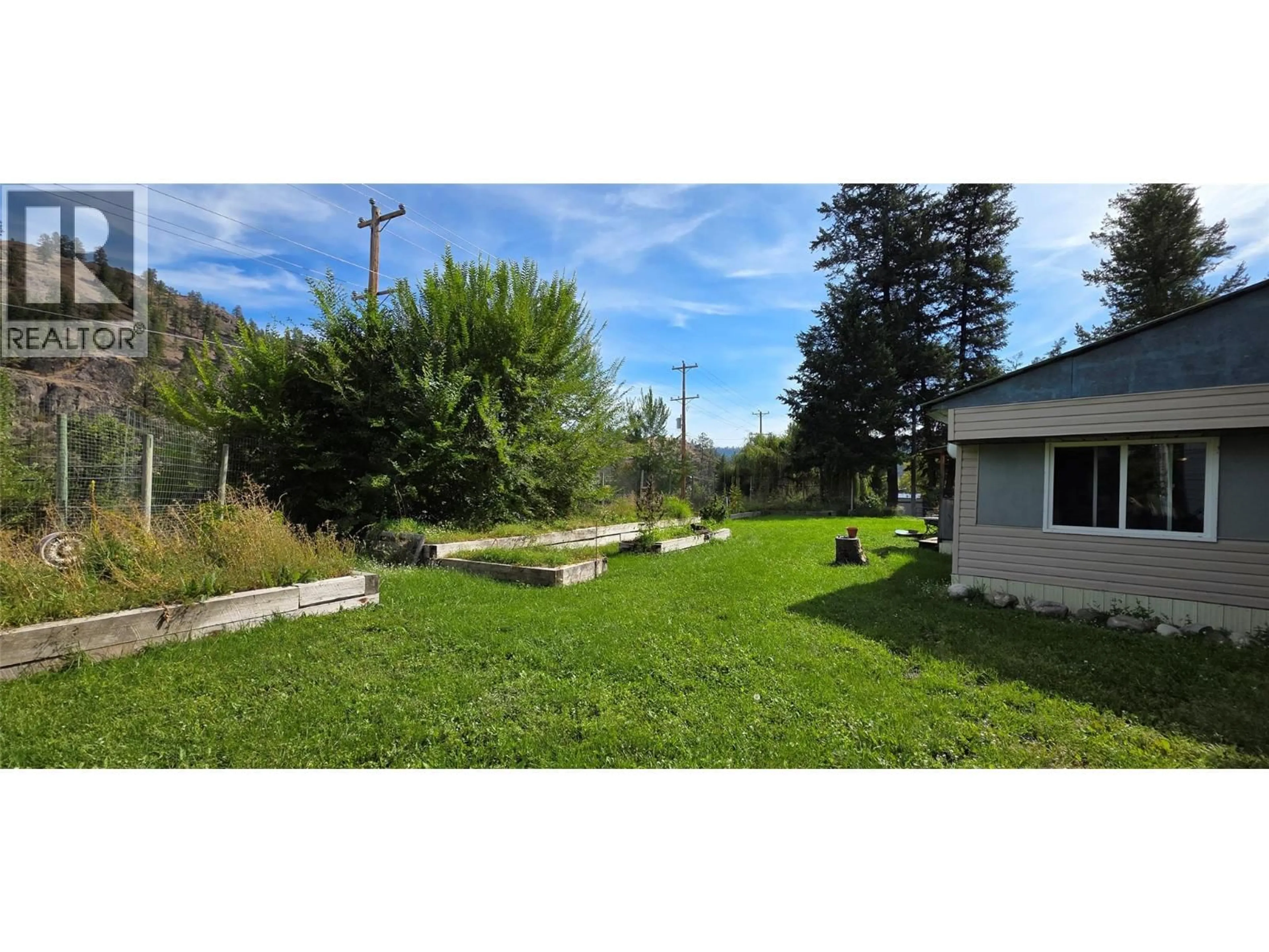 A pic from outside/outdoor area/front of a property/back of a property/a pic from drone, unknown for 4098 HIGHWAY 3 OTHER, Rock Creek British Columbia V0H1Y0