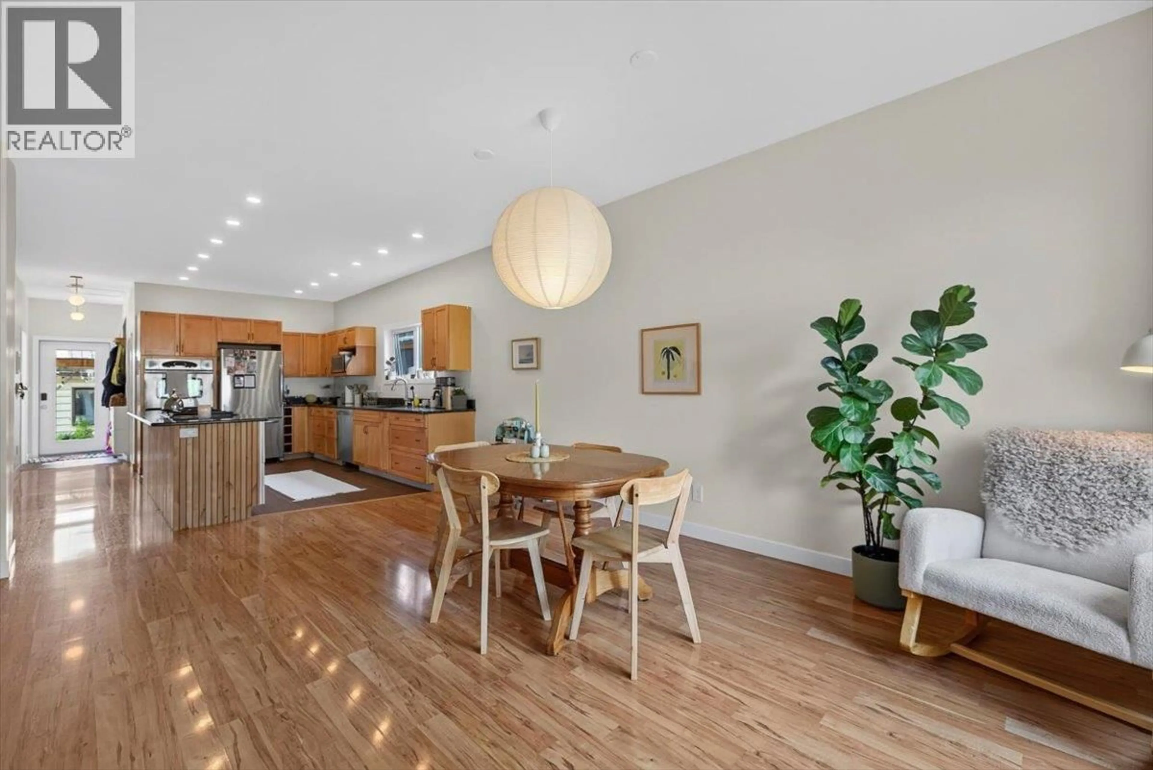 Open concept kitchen, wood/laminate floor for 1092 5TH AVENUE, Fernie British Columbia V0B1M0
