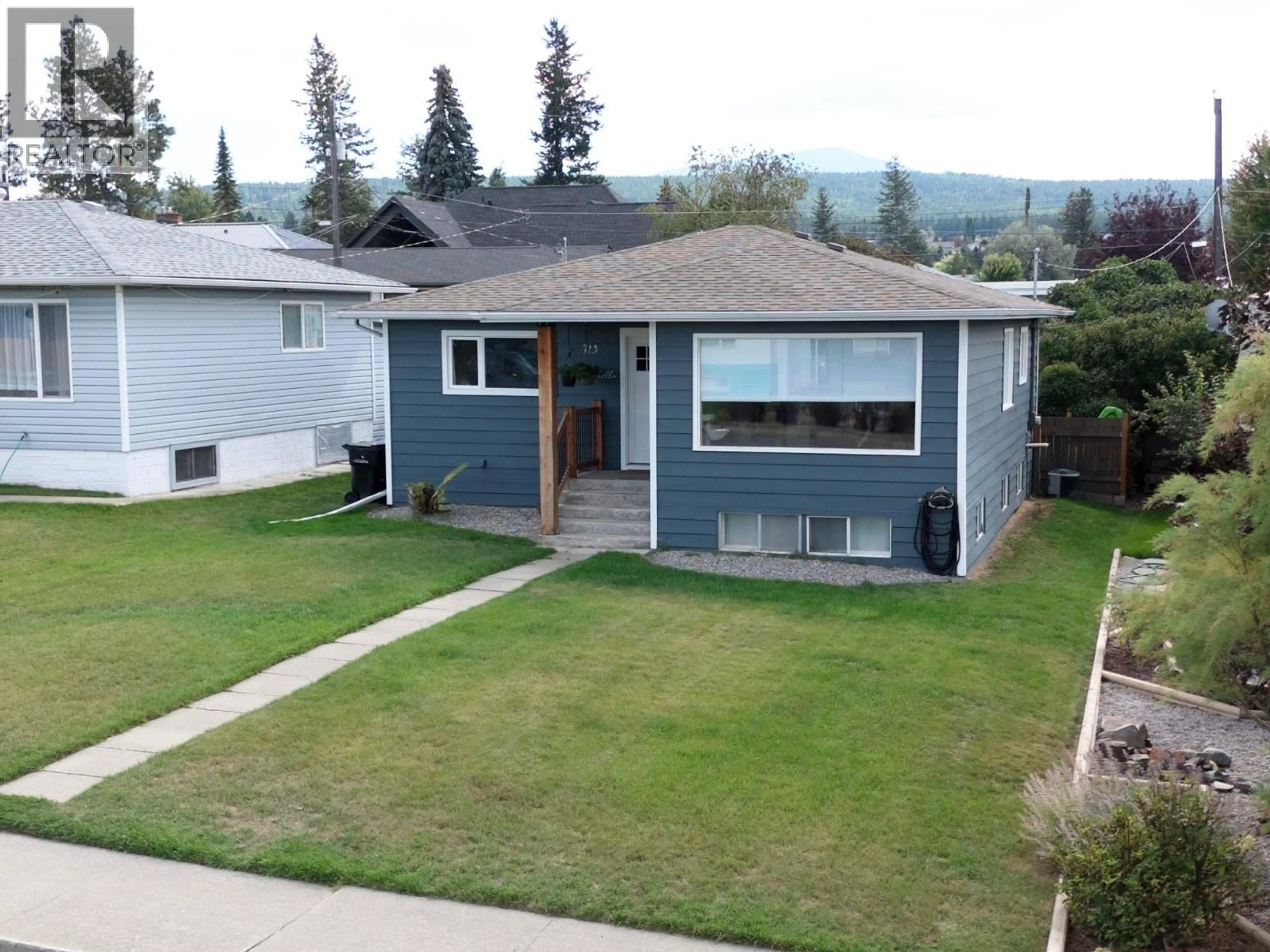 A pic from outside/outdoor area/front of a property/back of a property/a pic from drone, mountain view for 713 7TH STREET SOUTH, Cranbrook British Columbia V1C1N2