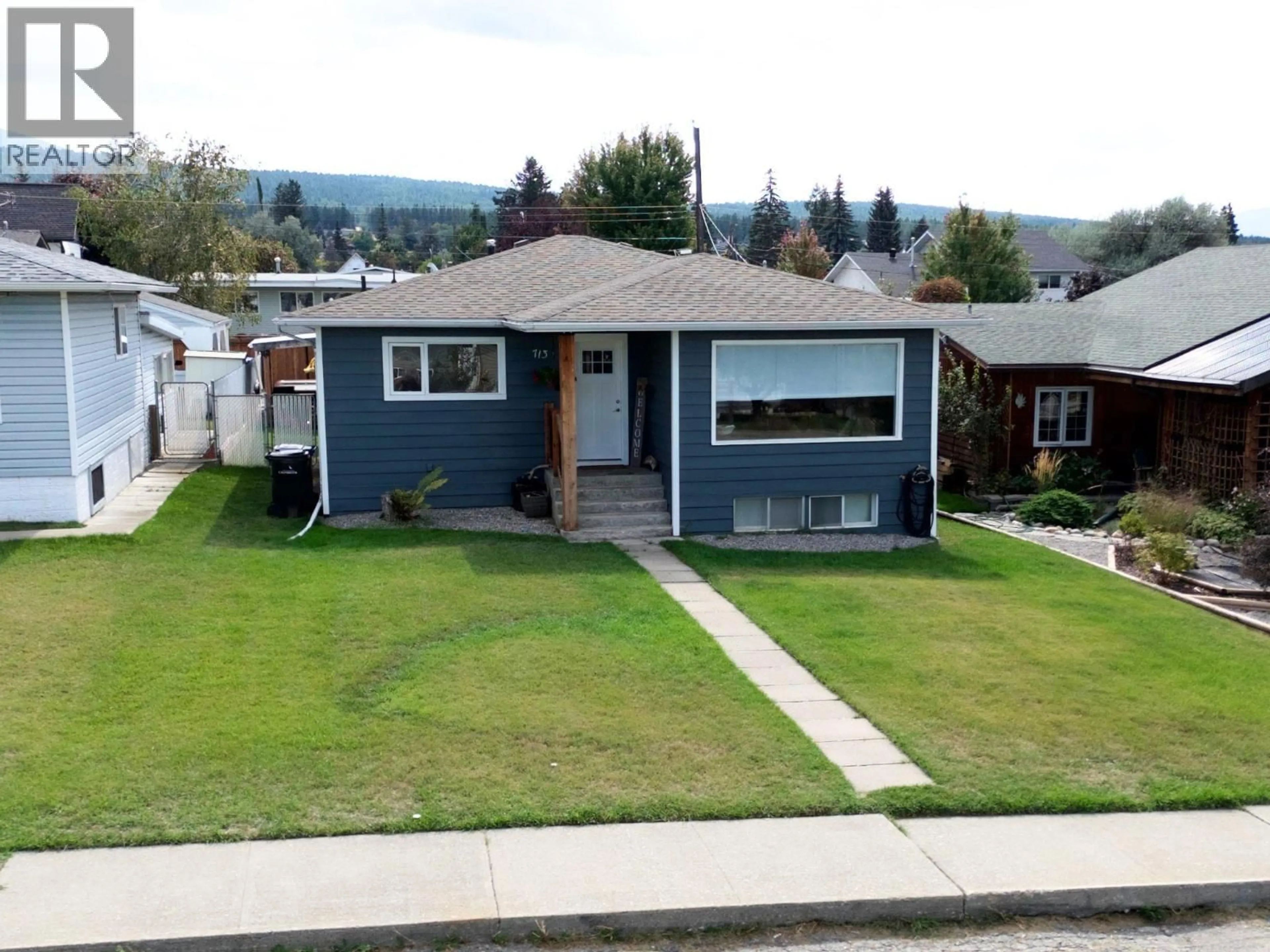Home with vinyl exterior material, street for 713 7TH STREET SOUTH, Cranbrook British Columbia V1C1N2