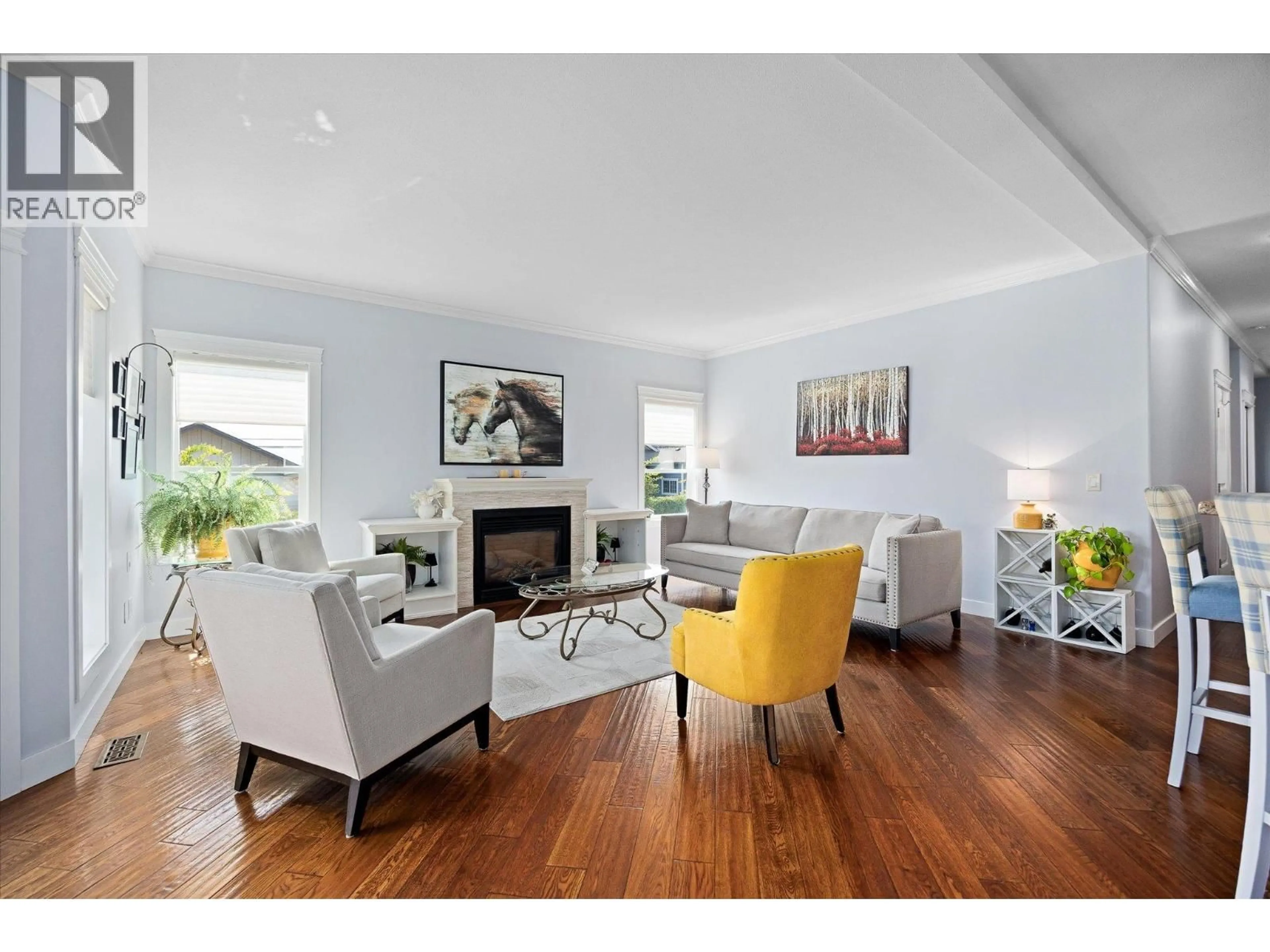 Living room with furniture, wood/laminate floor for 2181 MIMOSA DRIVE, Westbank British Columbia V4T3A5