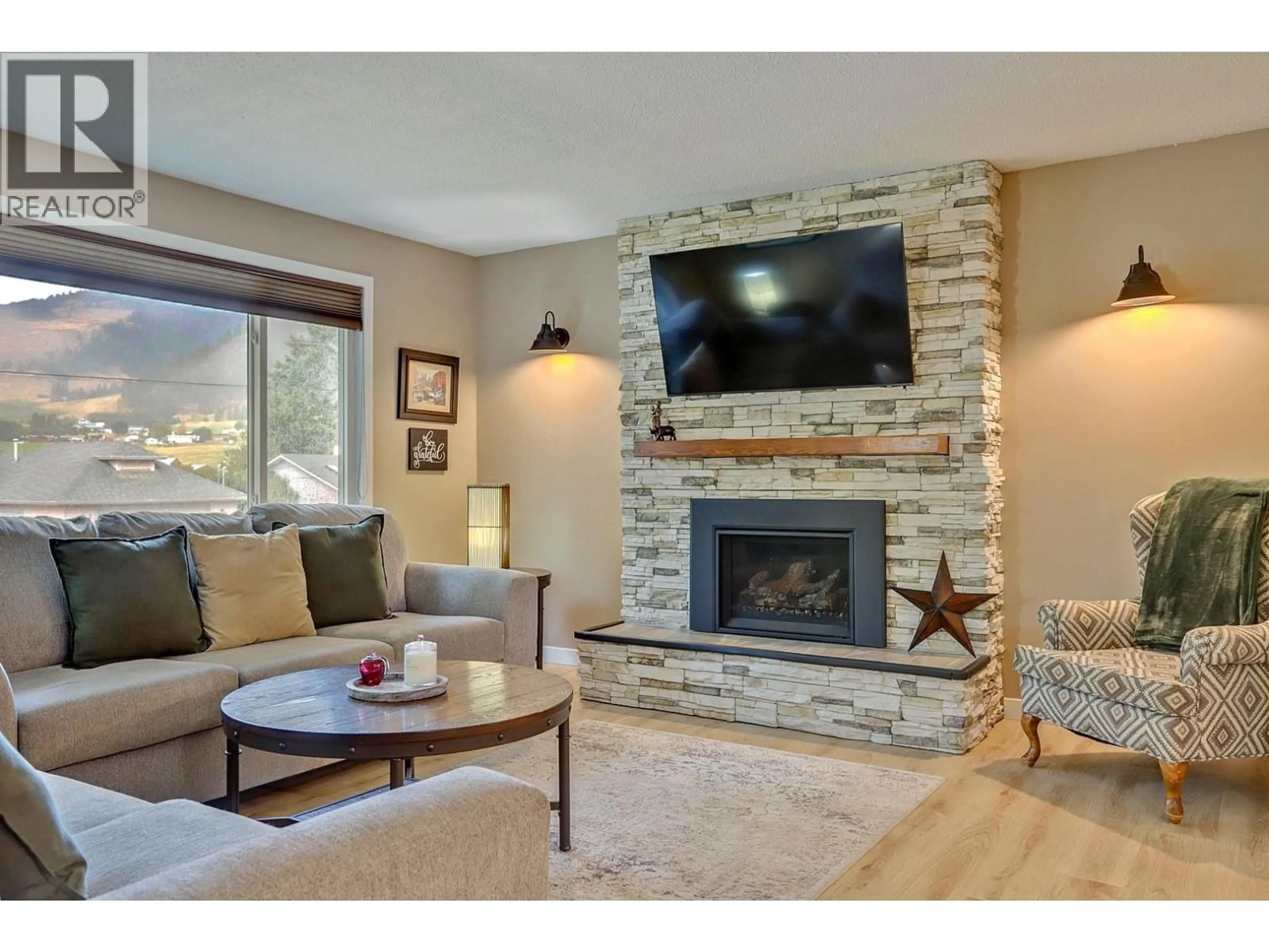 Living room with furniture, unknown for 9633 BESSETTE ROAD, Coldstream British Columbia V1B3G8