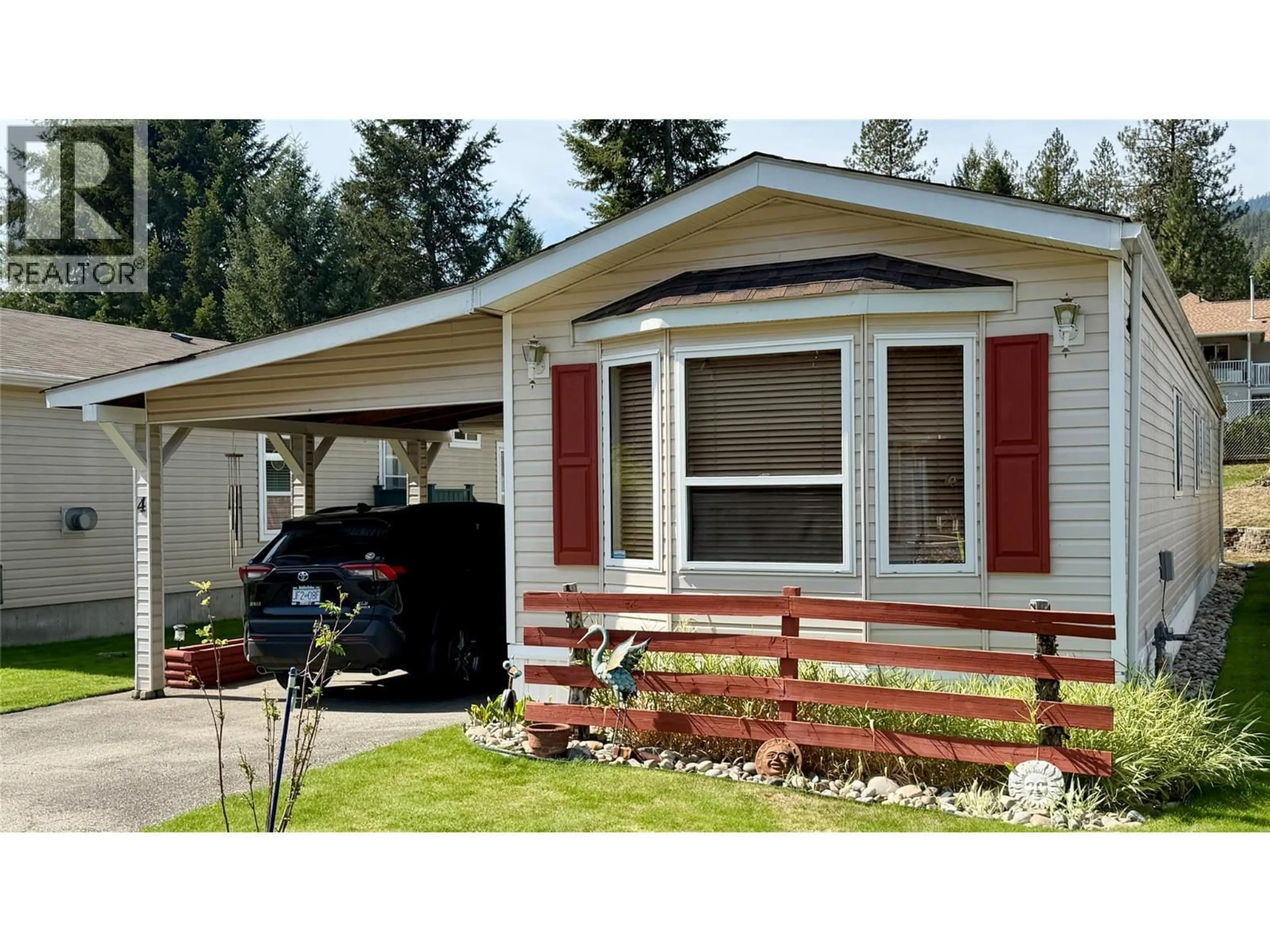 Home with vinyl exterior material, street for 4 - 1500 NEIMI ROAD, Christina Lake British Columbia V0H1E1