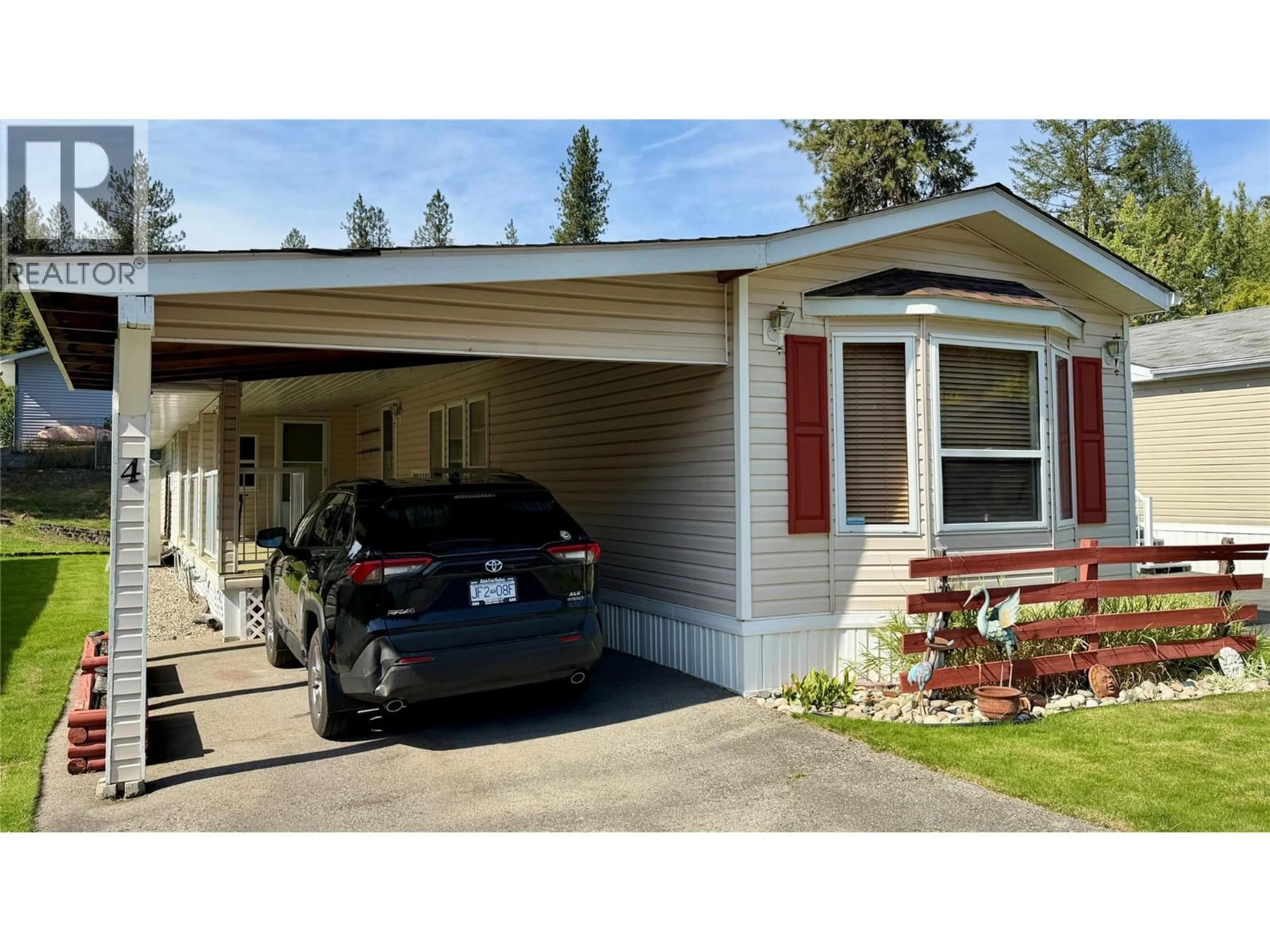 Home with vinyl exterior material, street for 4 - 1500 NEIMI ROAD, Christina Lake British Columbia V0H1E1