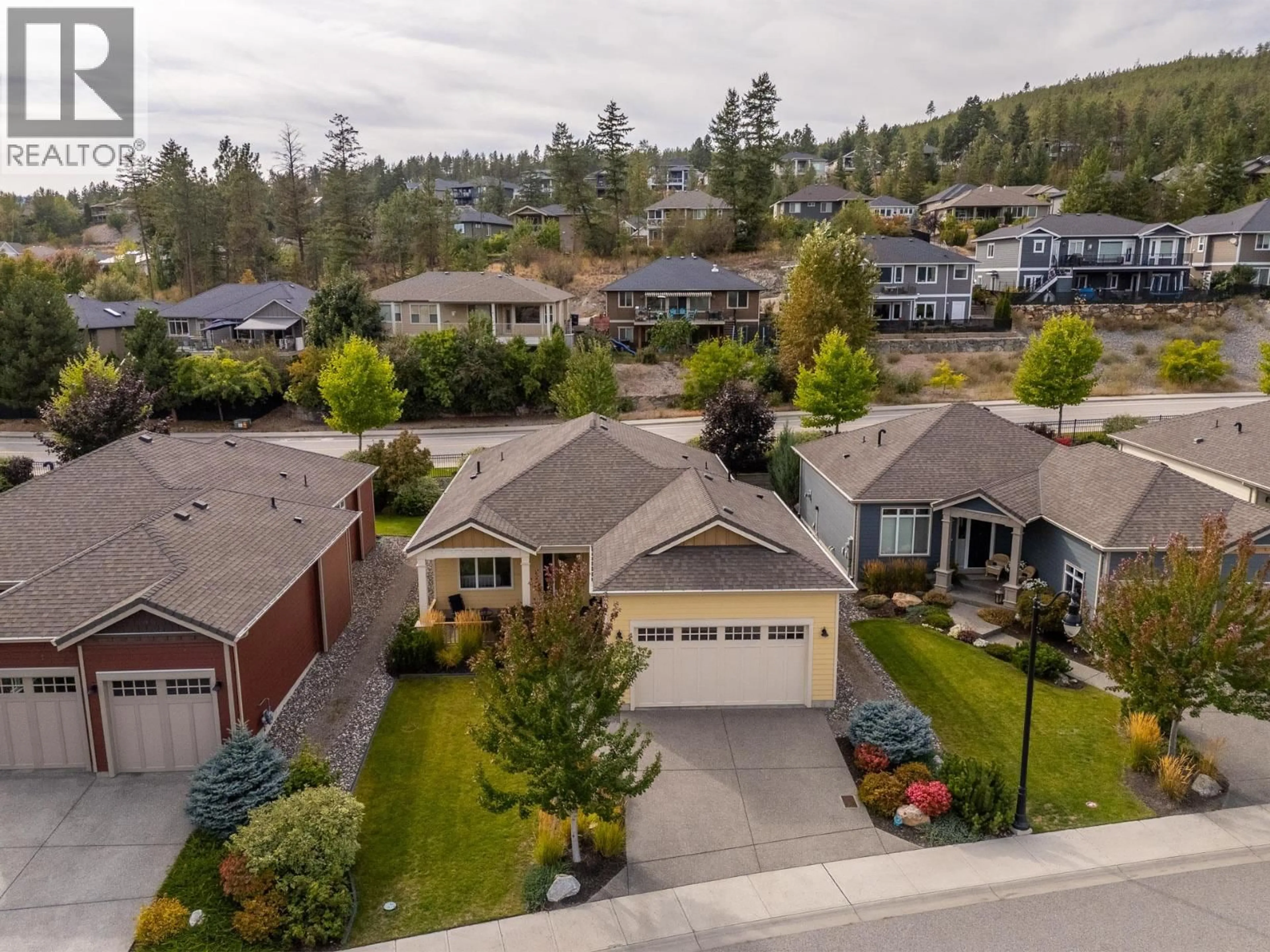 A pic from outside/outdoor area/front of a property/back of a property/a pic from drone, street for 13155 STACCATO DRIVE, Lake Country British Columbia V4V2P8