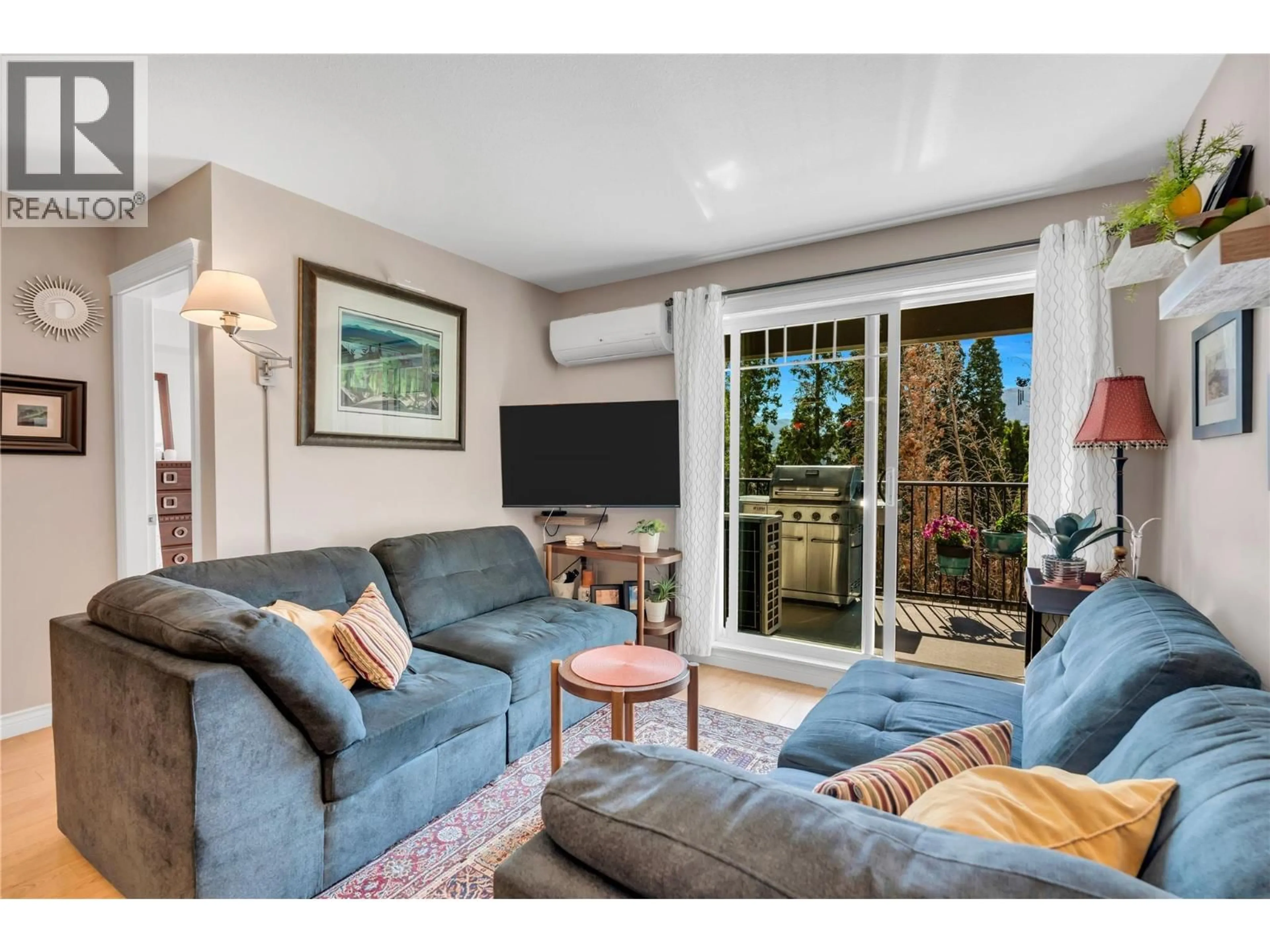 Living room with furniture, unknown for 203 - 101 COSSAR AVENUE, Penticton British Columbia V2A2V3