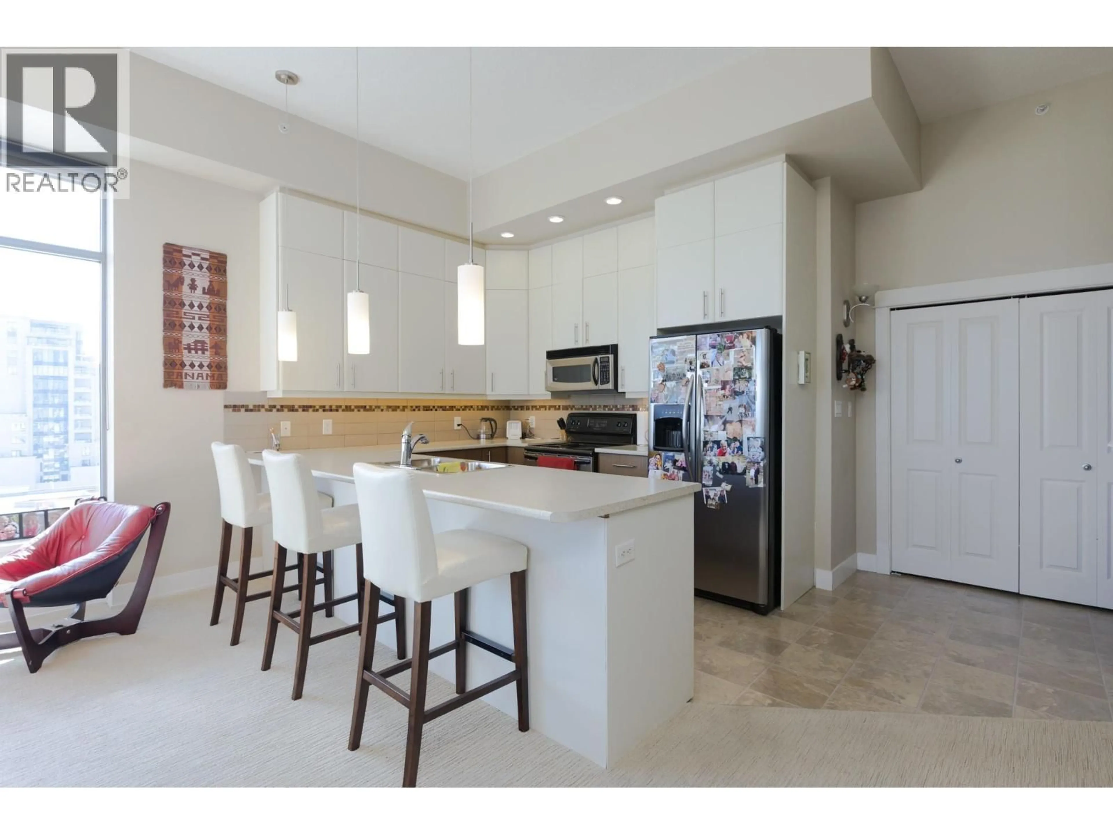 Open concept kitchen, ceramic/tile floor for 804 - 1329 ELLIS STREET, Kelowna British Columbia V1Y9X5