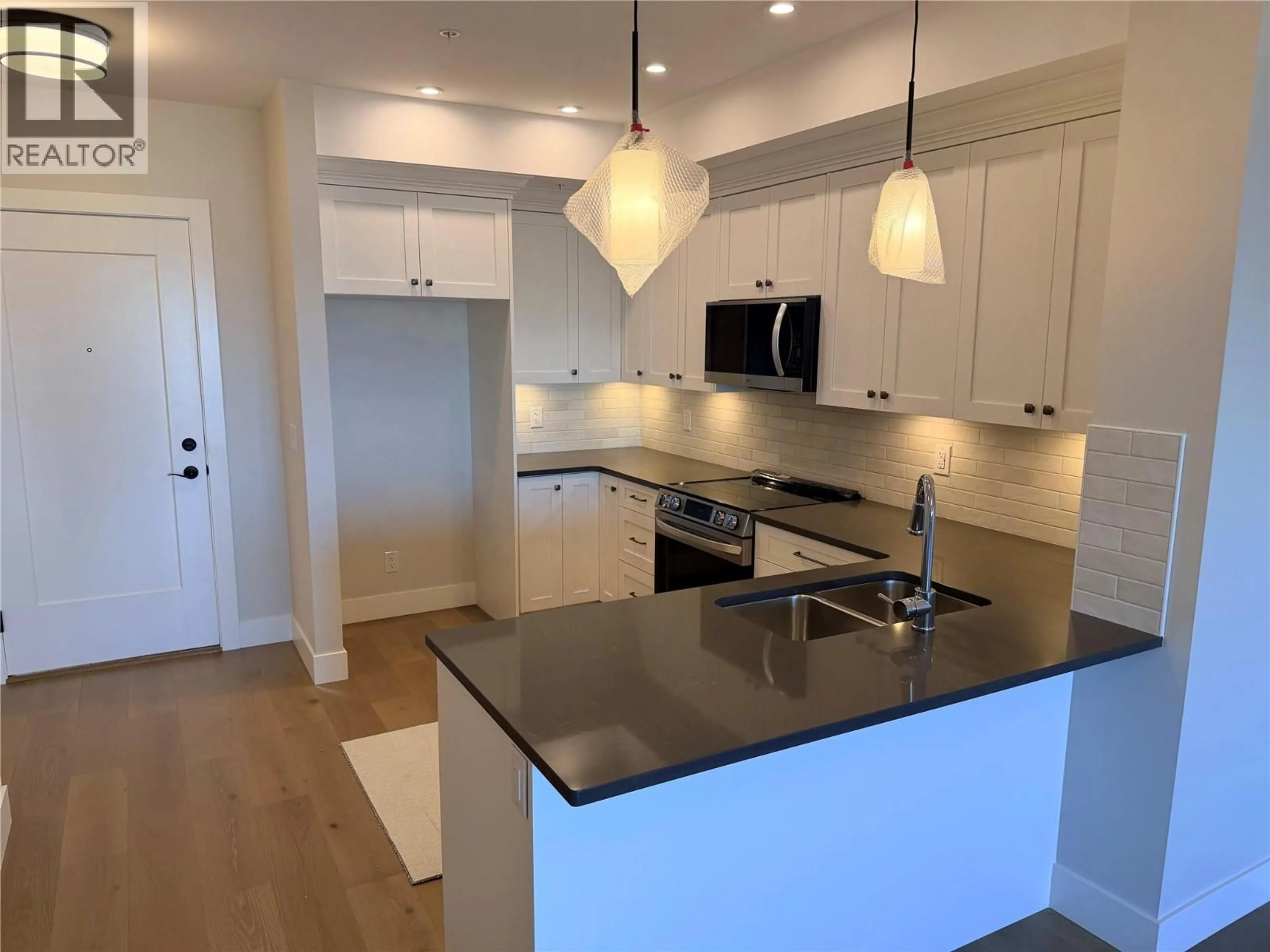 Open concept kitchen, unknown for 208 - 2171 VAN HORNE DRIVE, Kamloops British Columbia V1S0E2