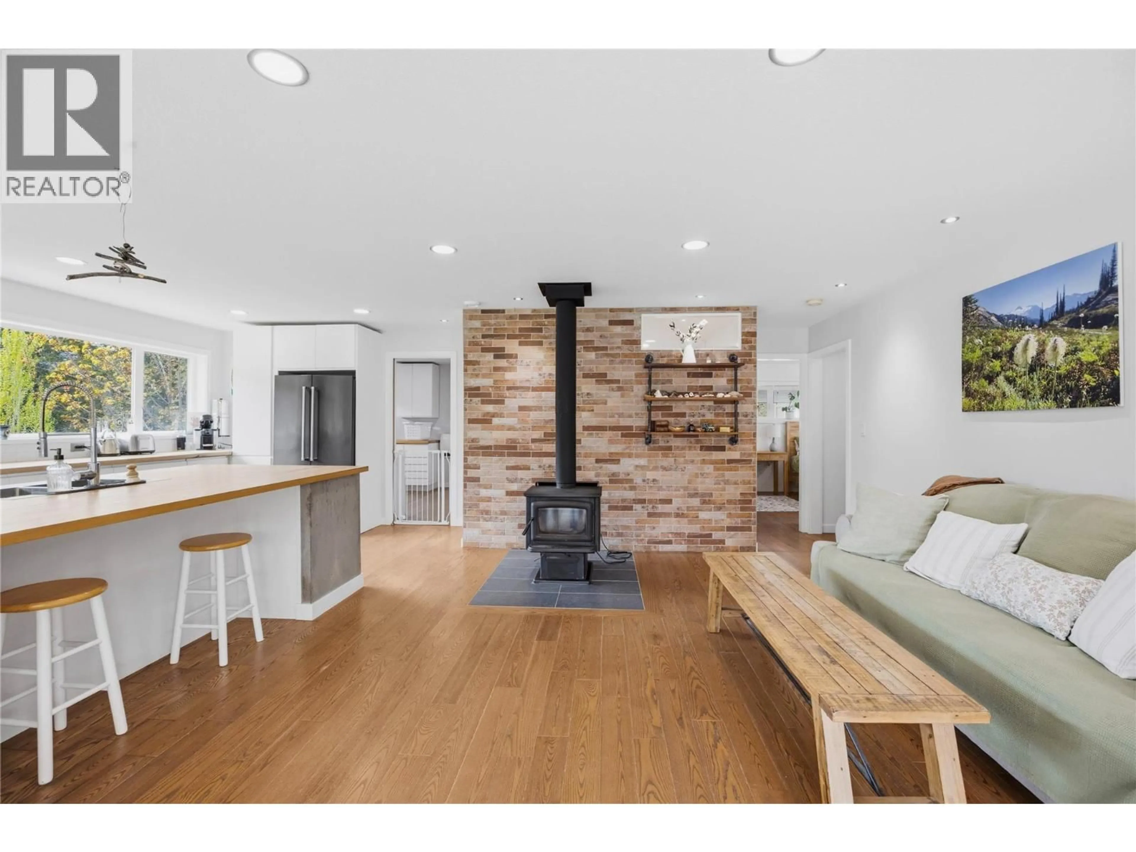Open concept kitchen, wood/laminate floor for 746 MCMURRAY ROAD, Kaleden British Columbia V0H1K0