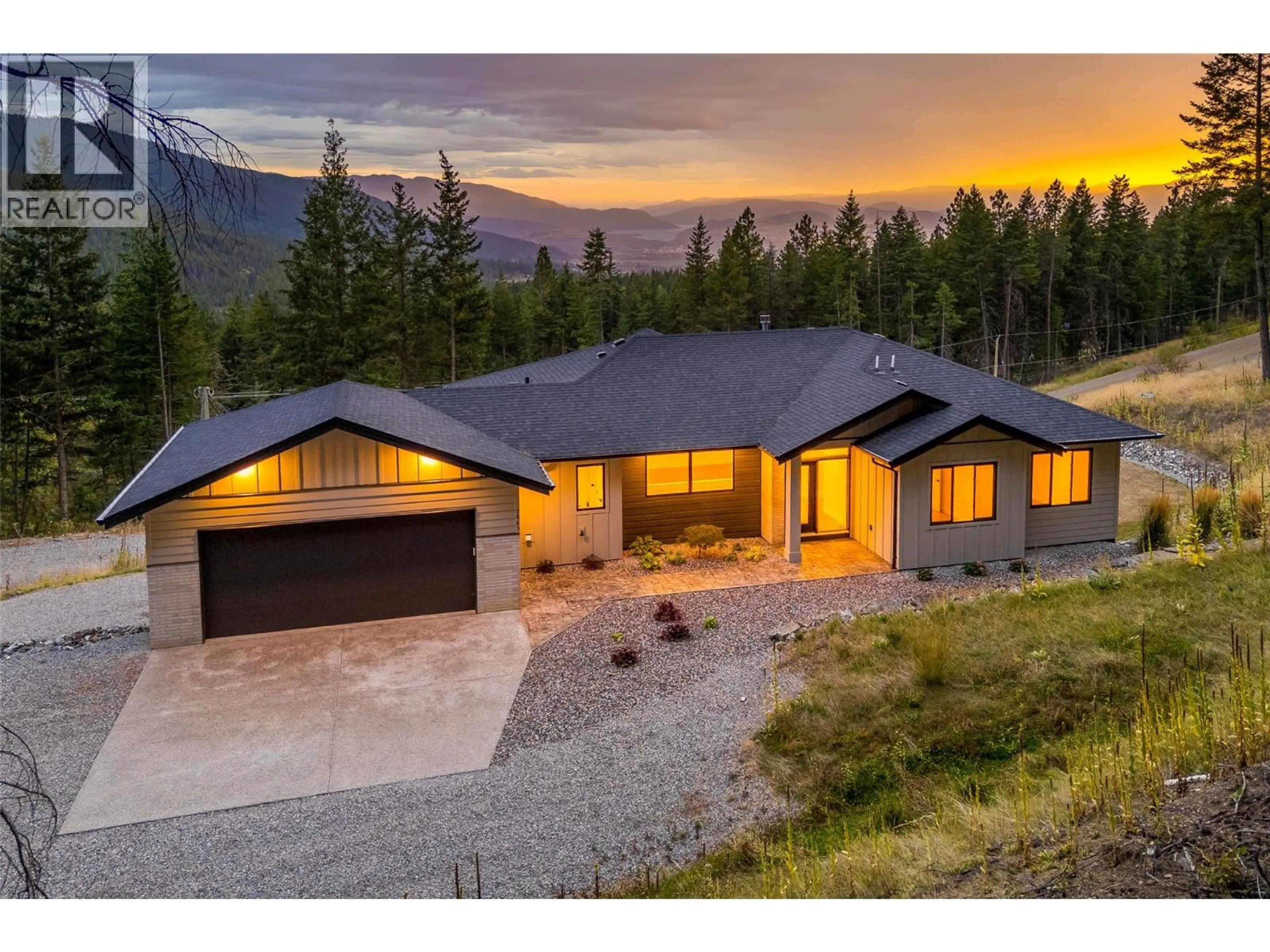 A pic from outside/outdoor area/front of a property/back of a property/a pic from drone, mountain view for 7863 BOULTER ROAD, Vernon British Columbia V1B3N2