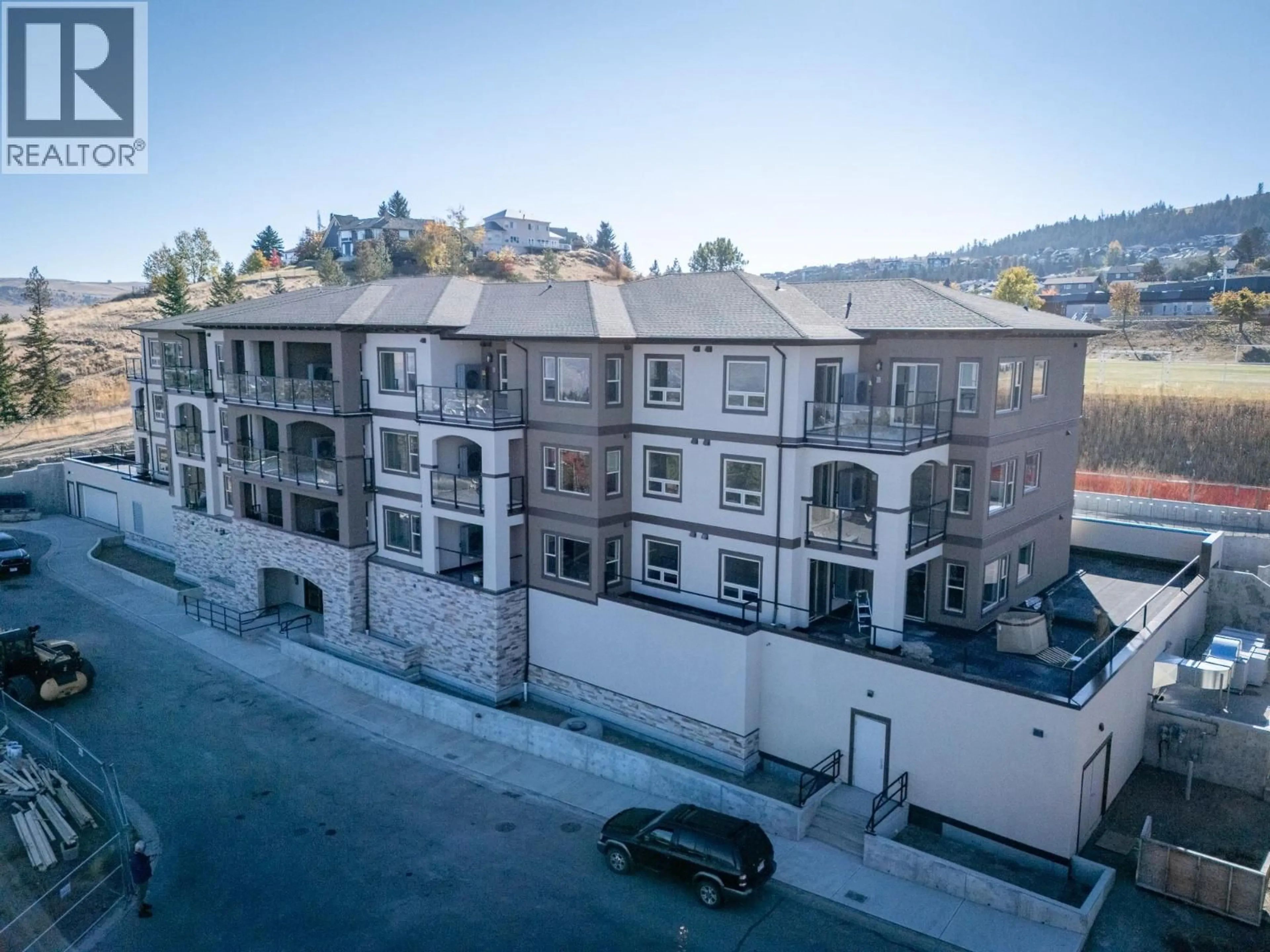 A pic from outside/outdoor area/front of a property/back of a property/a pic from drone, unknown for 207 - 2171 VAN HORNE DRIVE, Kamloops British Columbia V1S0E2