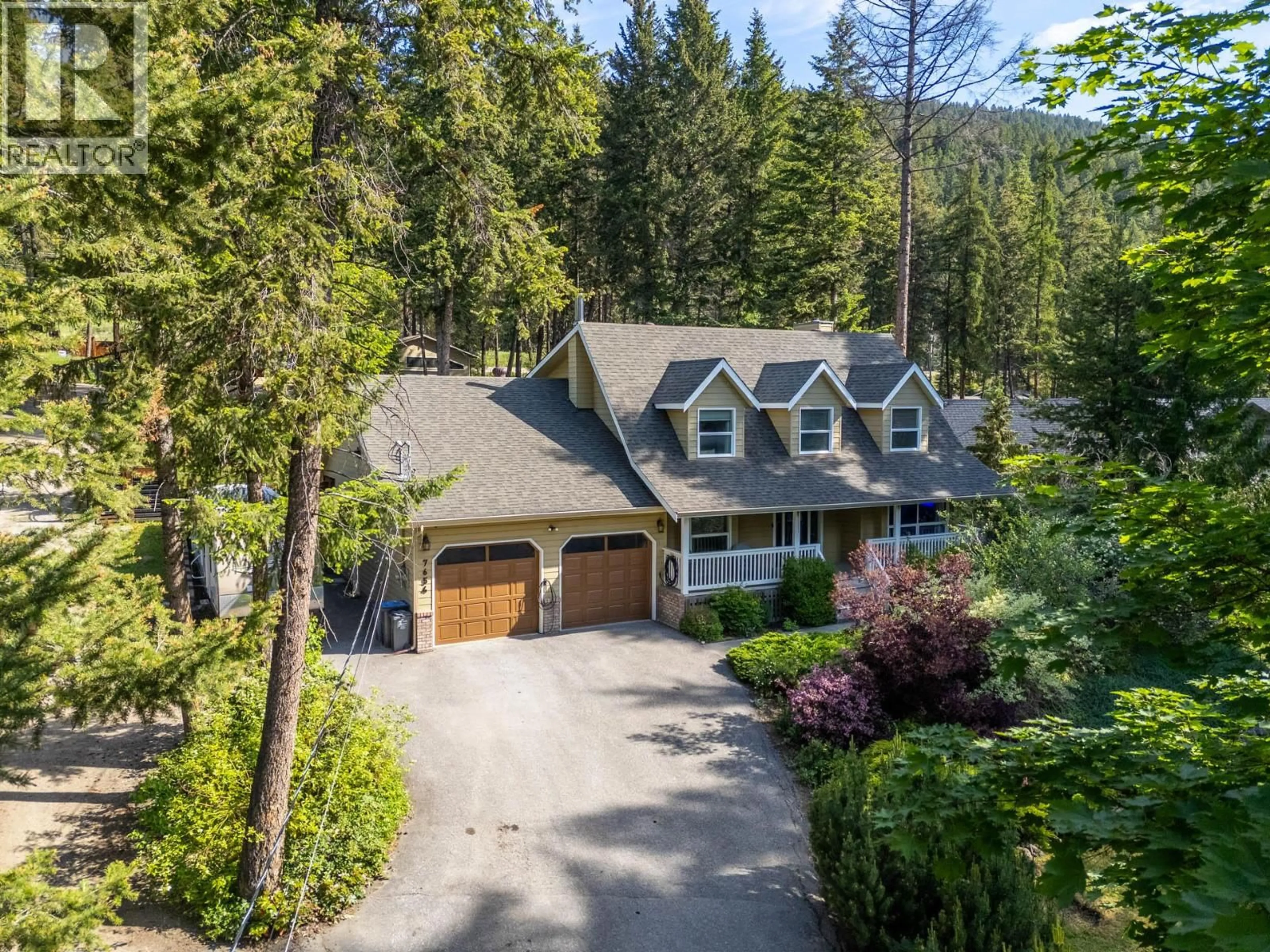 A pic from outside/outdoor area/front of a property/back of a property/a pic from drone, unknown for 7654 FALCONRIDGE CRESCENT, Kelowna British Columbia V1P1J1