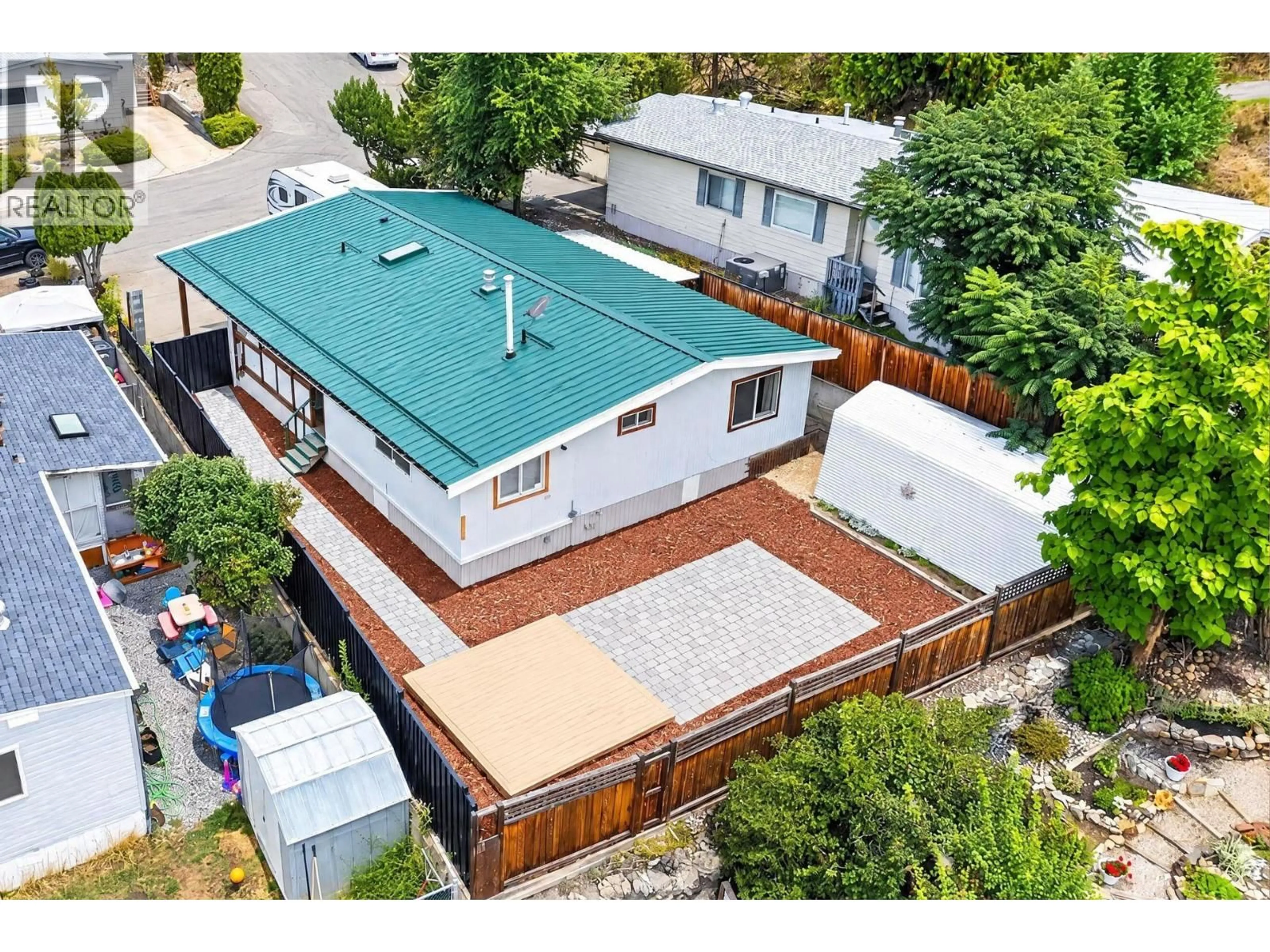 A pic from outside/outdoor area/front of a property/back of a property/a pic from drone, street for 532 GUILDFORD COURT, Coldstream British Columbia V1B2E3