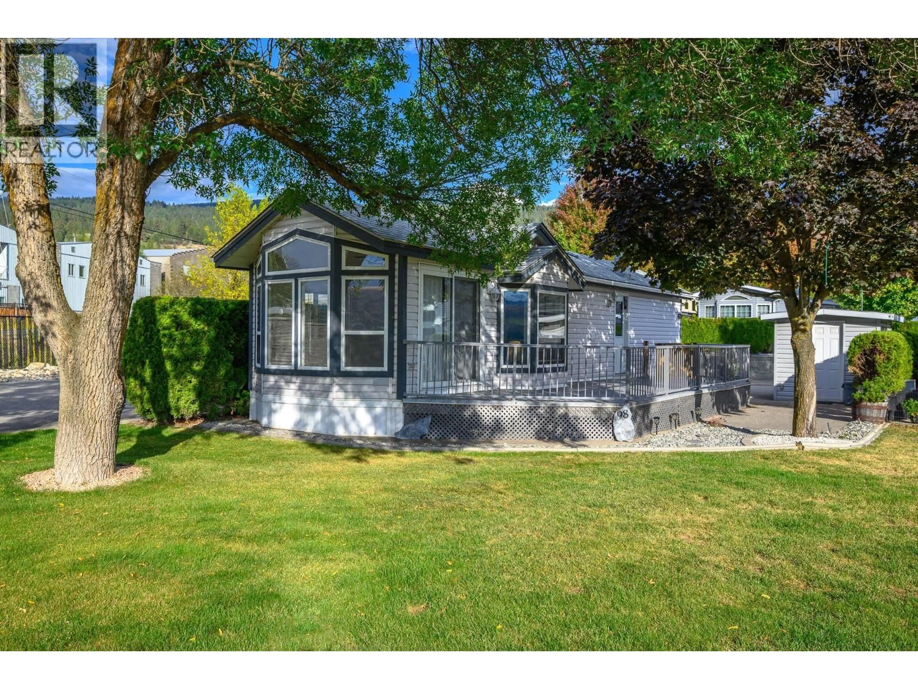 Home with vinyl exterior material, street for 98 - 8000 HIGHLAND ROAD, Vernon British Columbia V1B3W5