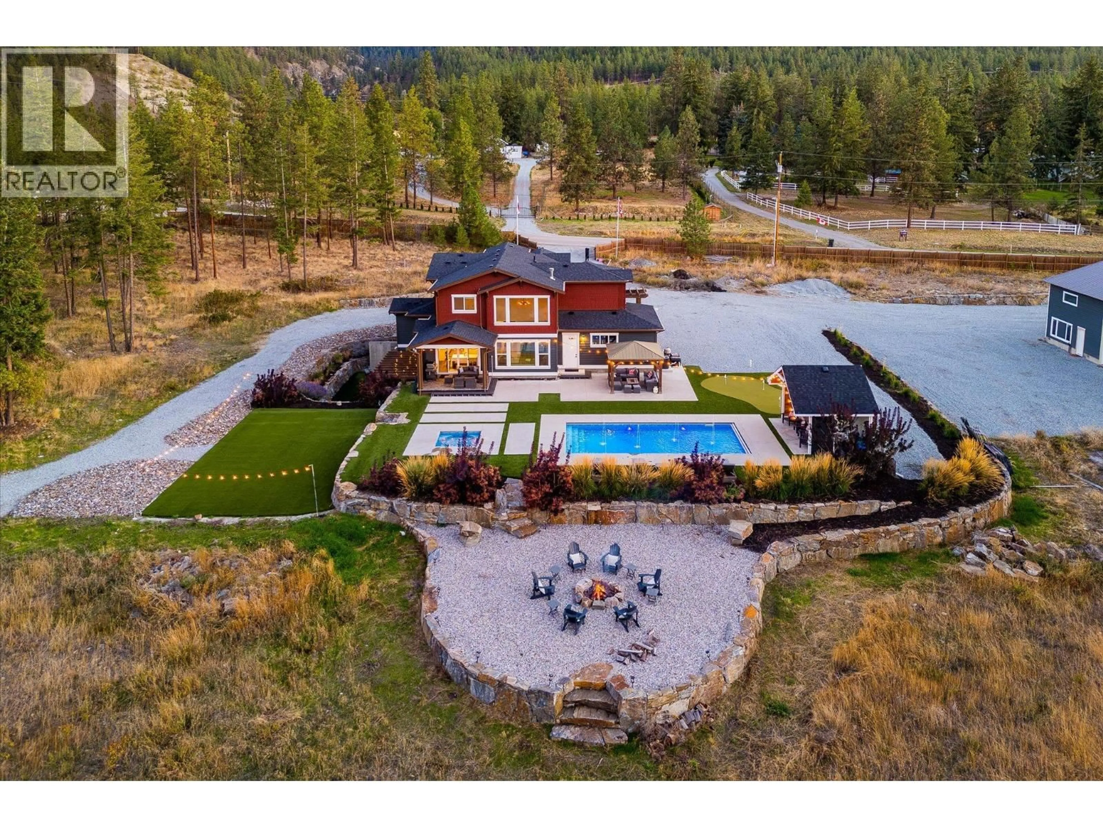 A pic from outside/outdoor area/front of a property/back of a property/a pic from drone, mountain view for 4702 MCCULLOCH ROAD, Kelowna British Columbia V1W4G1