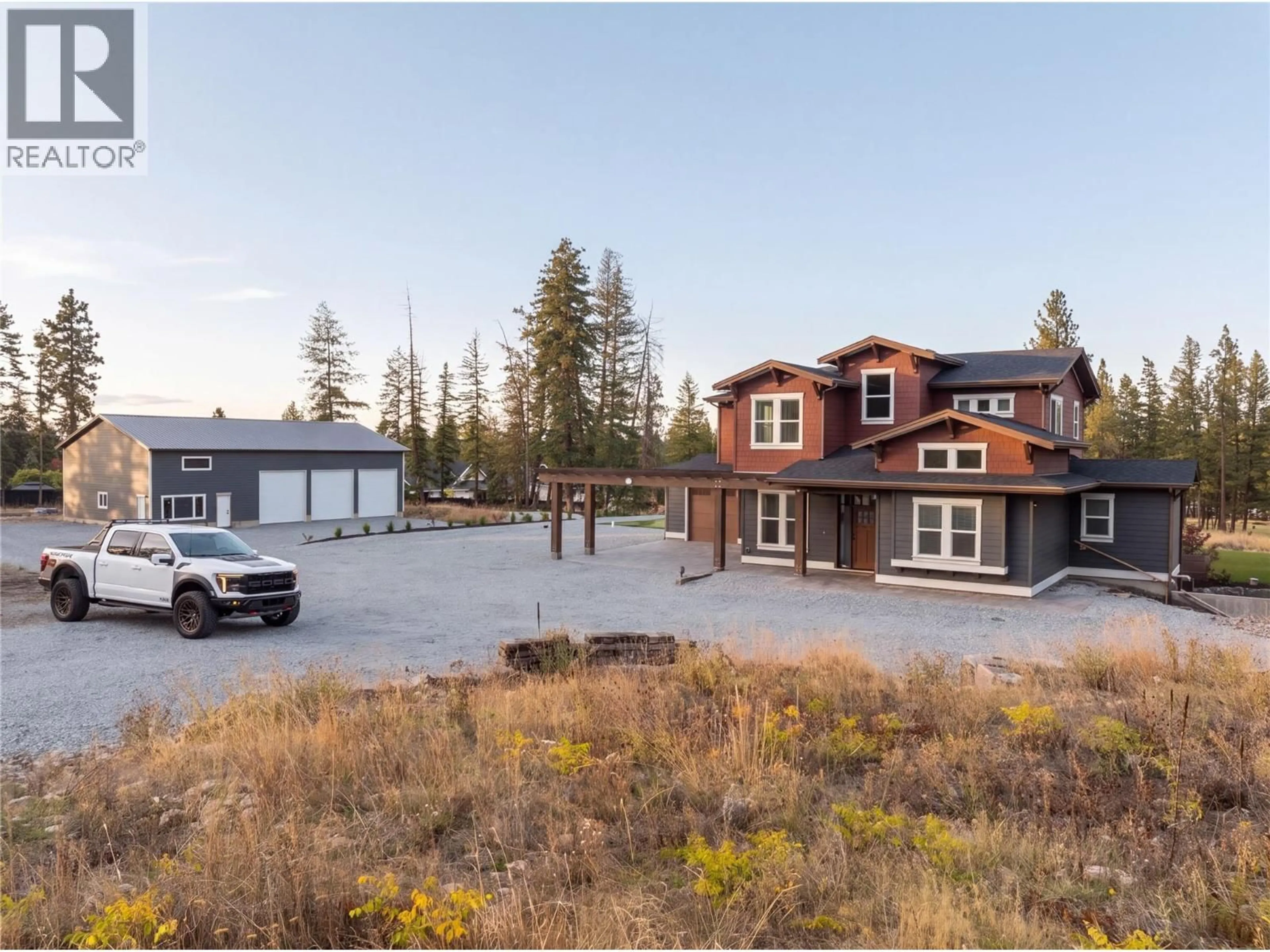 A pic from outside/outdoor area/front of a property/back of a property/a pic from drone, mountain view for 4702 MCCULLOCH ROAD, Kelowna British Columbia V1W4G1