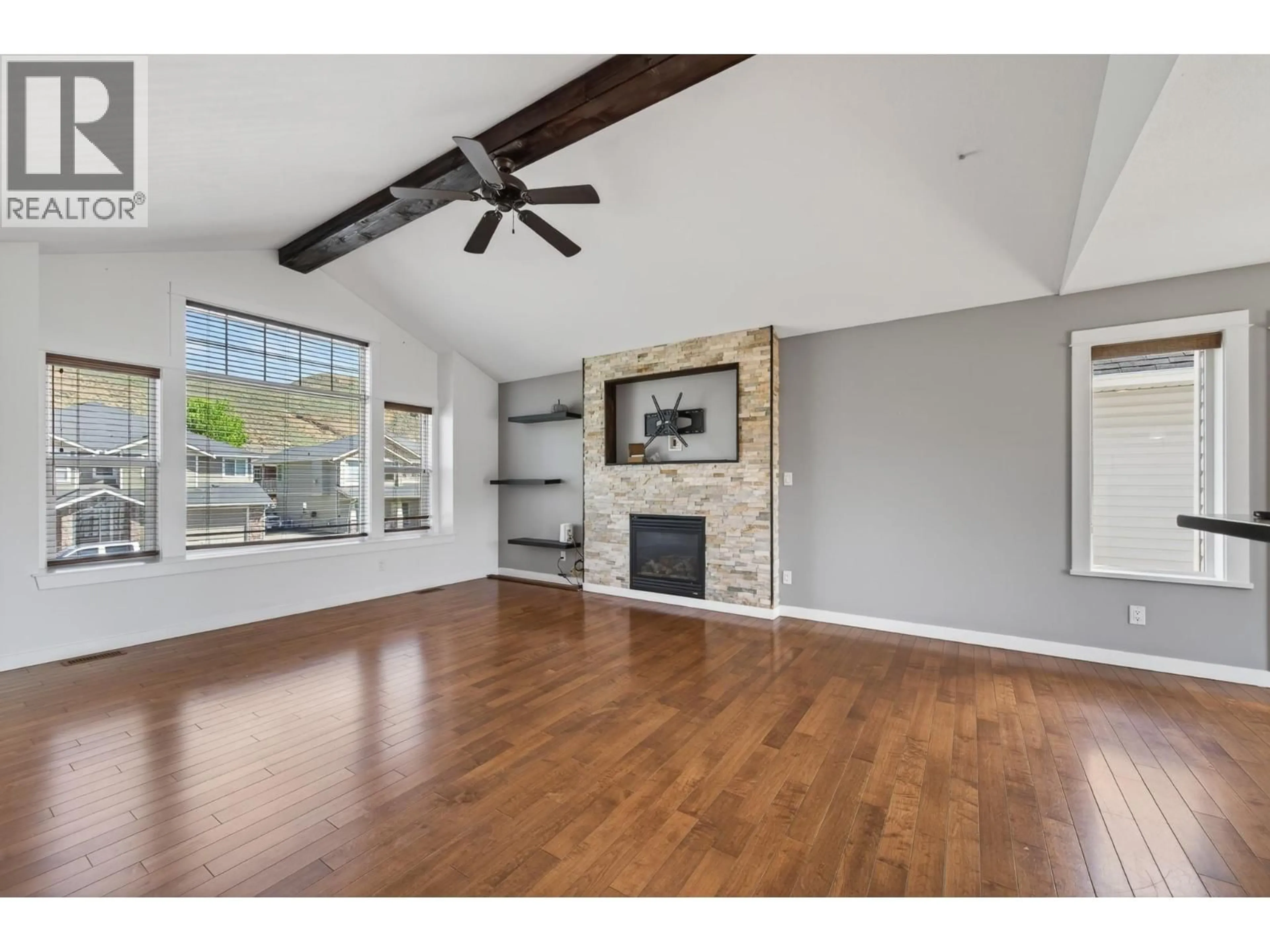 Living room with furniture, wood/laminate floor for 2635 ROSEWOOD AVENUE, Kamloops British Columbia V2B0C4